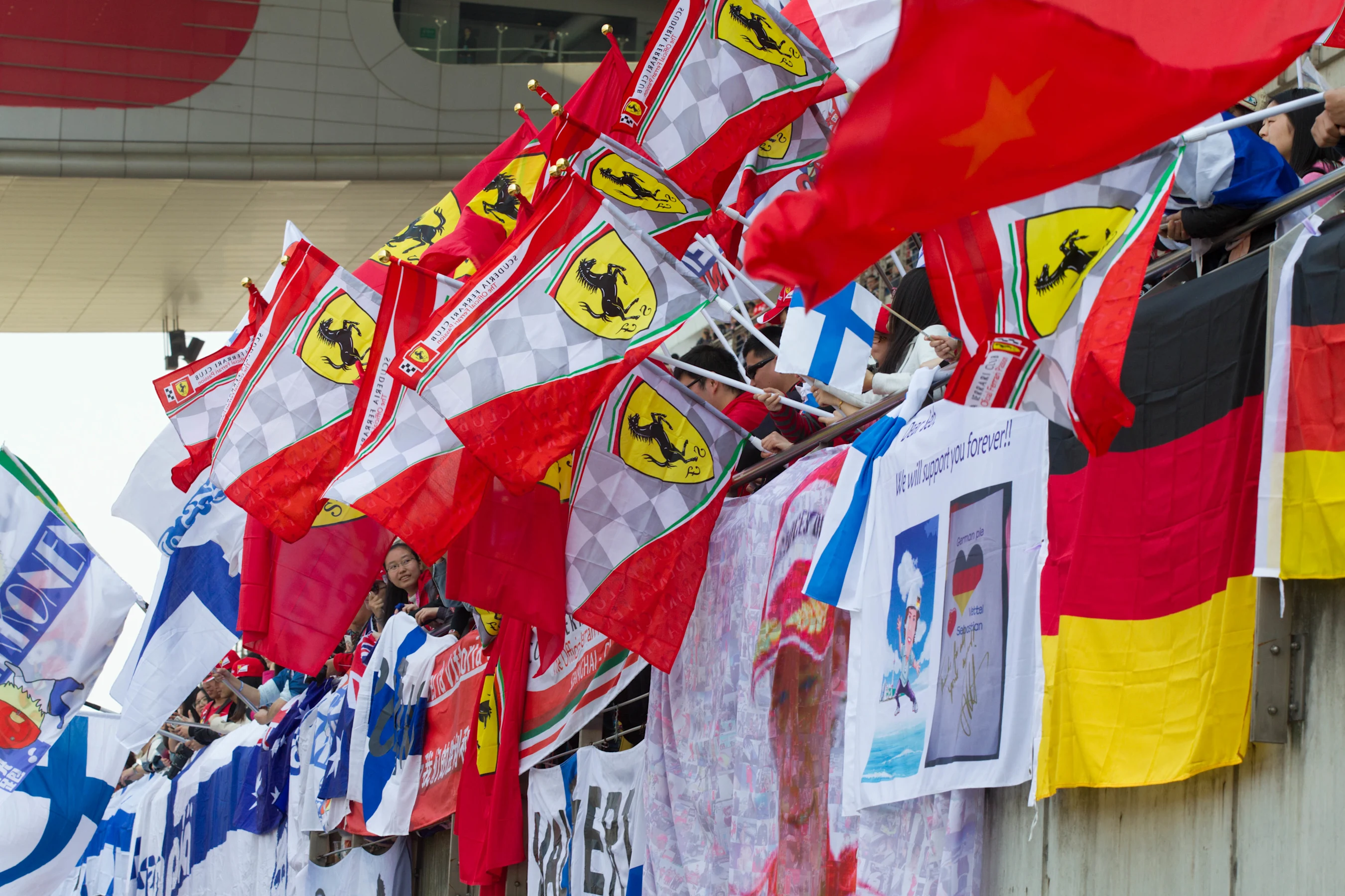 Fans with flags on the main grandstand at Formula One World Championship, Rd3, Chinese Grand Prix,