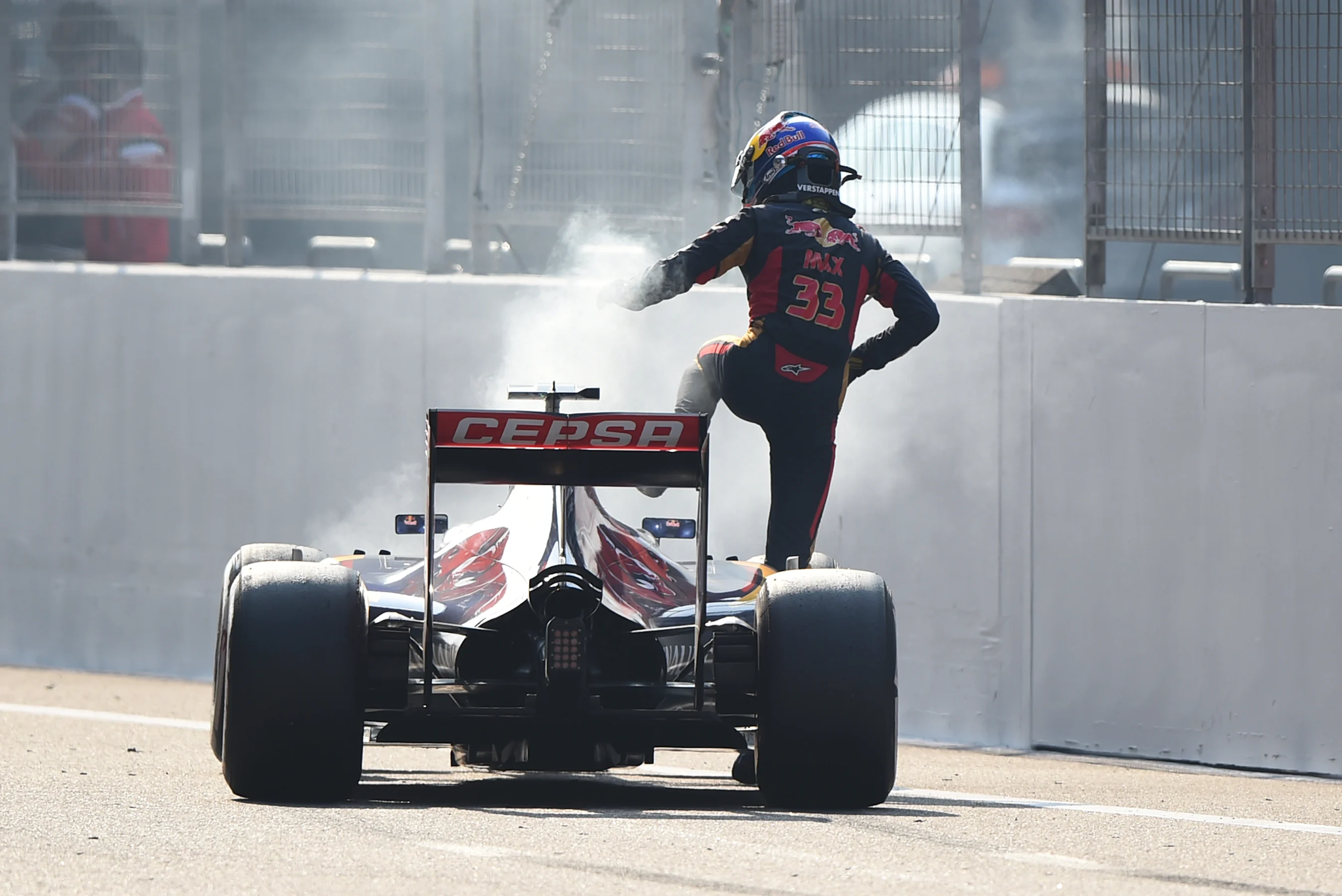 Max Verstappen (NDL) Scuderia Toro Rosso climbs out of his stricken car after blowing his engine on
