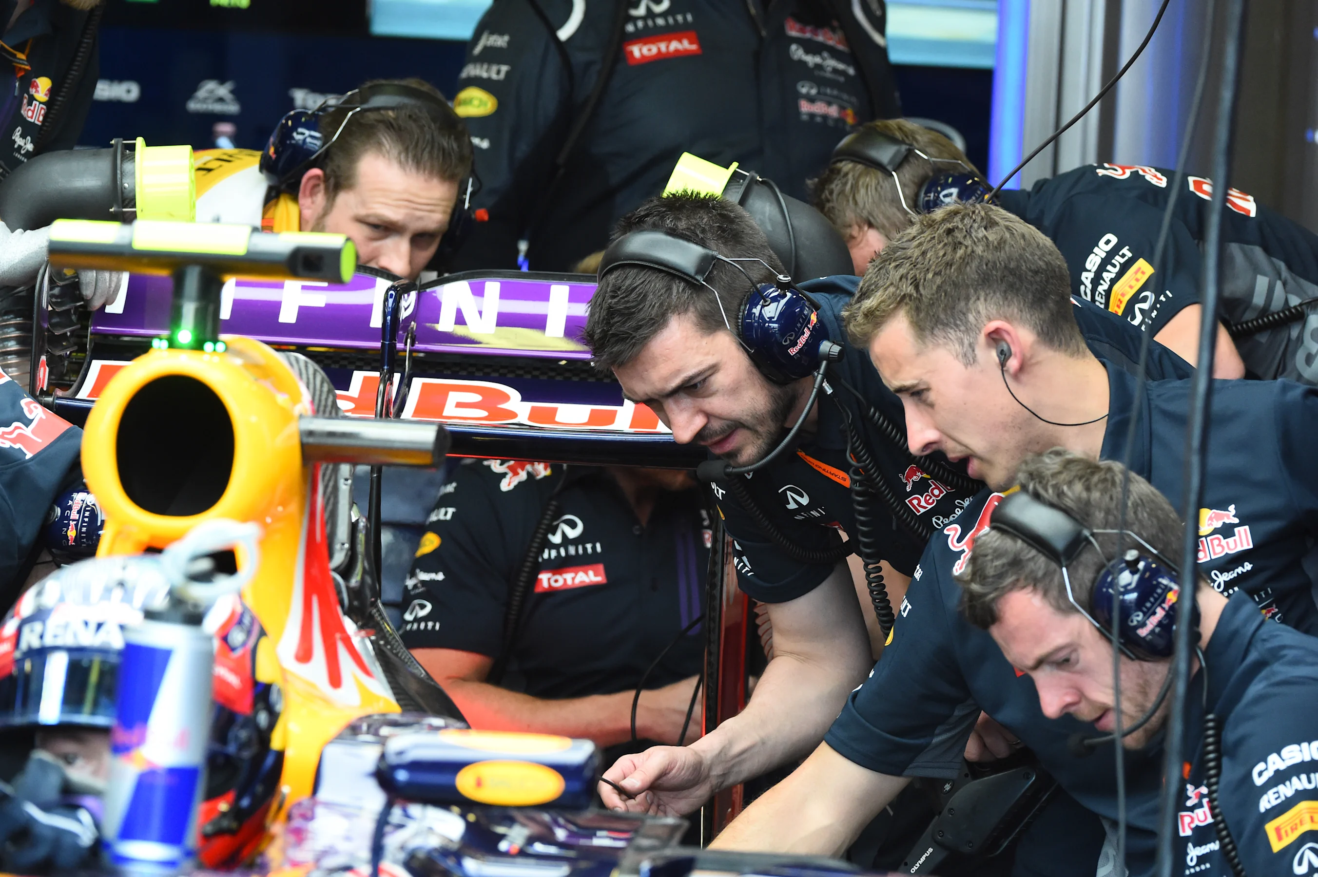 Red Bull Racing RB11 mechanics checking the Renault engine at Formula One World Championship, Rd1,