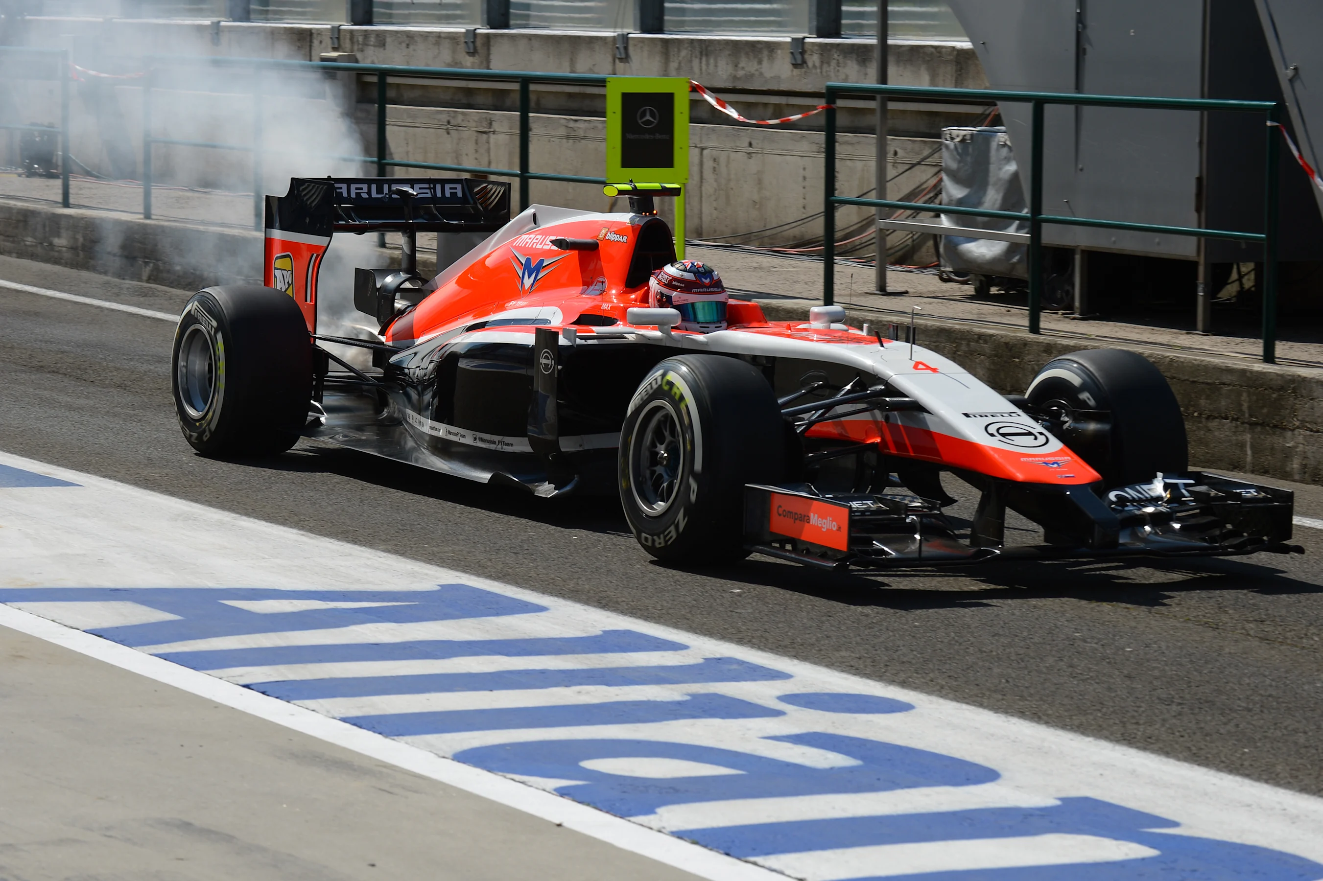 Max Chilton (GBR) Marussia F1 Team MR03 with a fire in FP1. Formula One World Championship, Rd11,