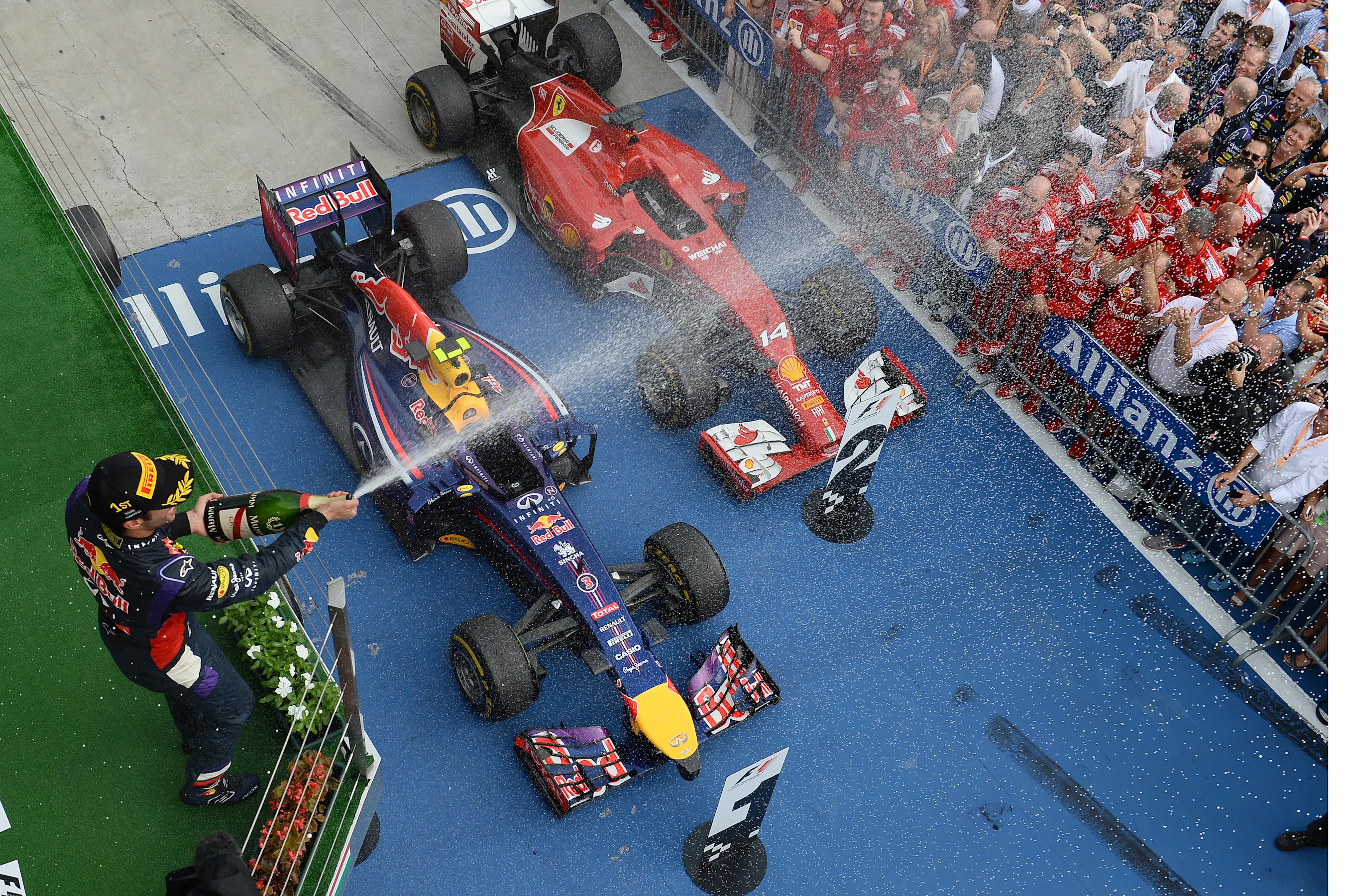 Race winner Daniel Ricciardo (AUS) Red Bull Racing sprays champagne on the podium. Paul Monaghan