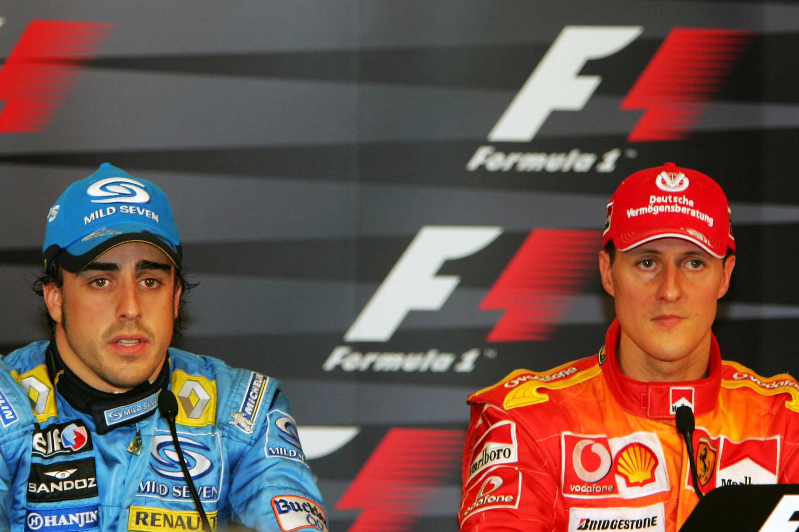 (L to R): second placed Fernando Alonso (ESP) Renault and pole sitter Michael Schumacher (GER)