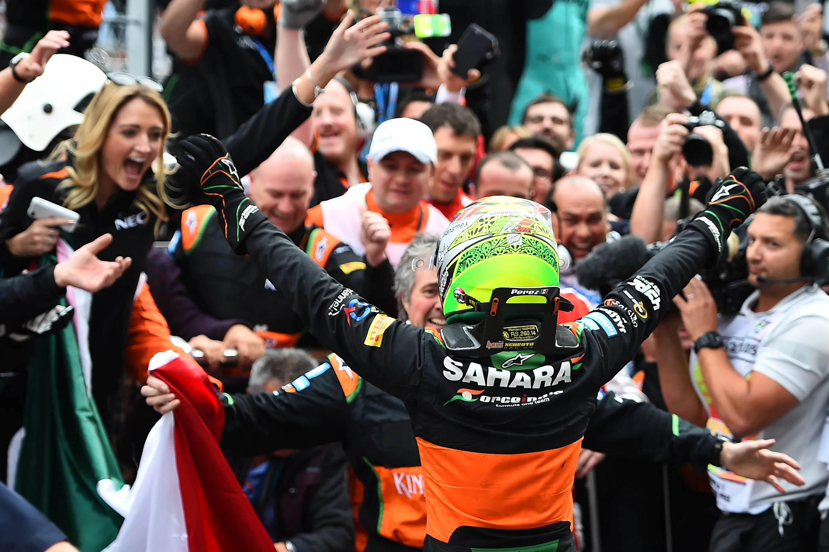 Sergio Perez (MEX) Force India celebrates in parc ferme at Formula One World Championship, Rd15,