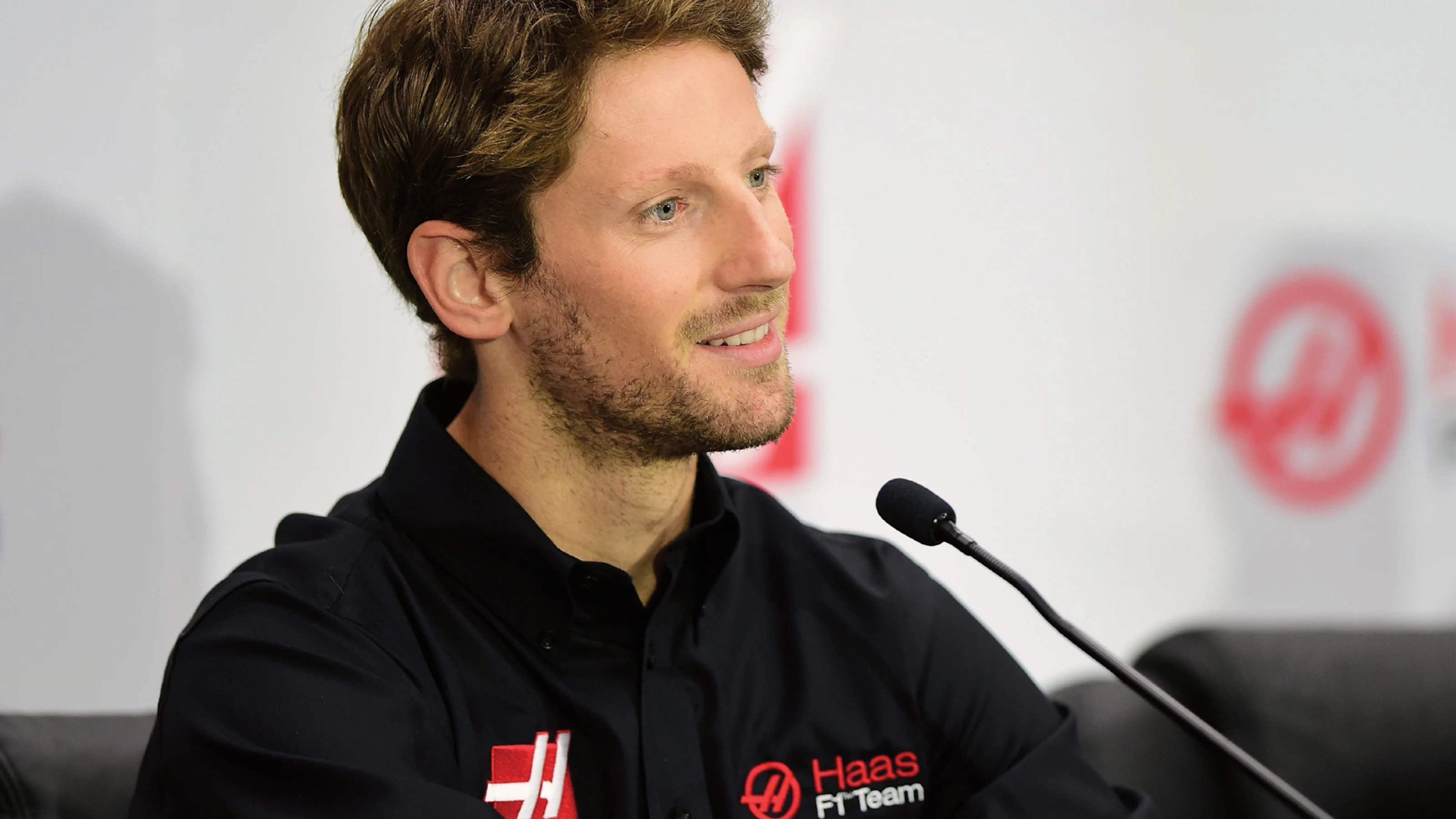 Romain Grosjean of France speaks during a press conference as Haas F1 Team announces Grosjean as