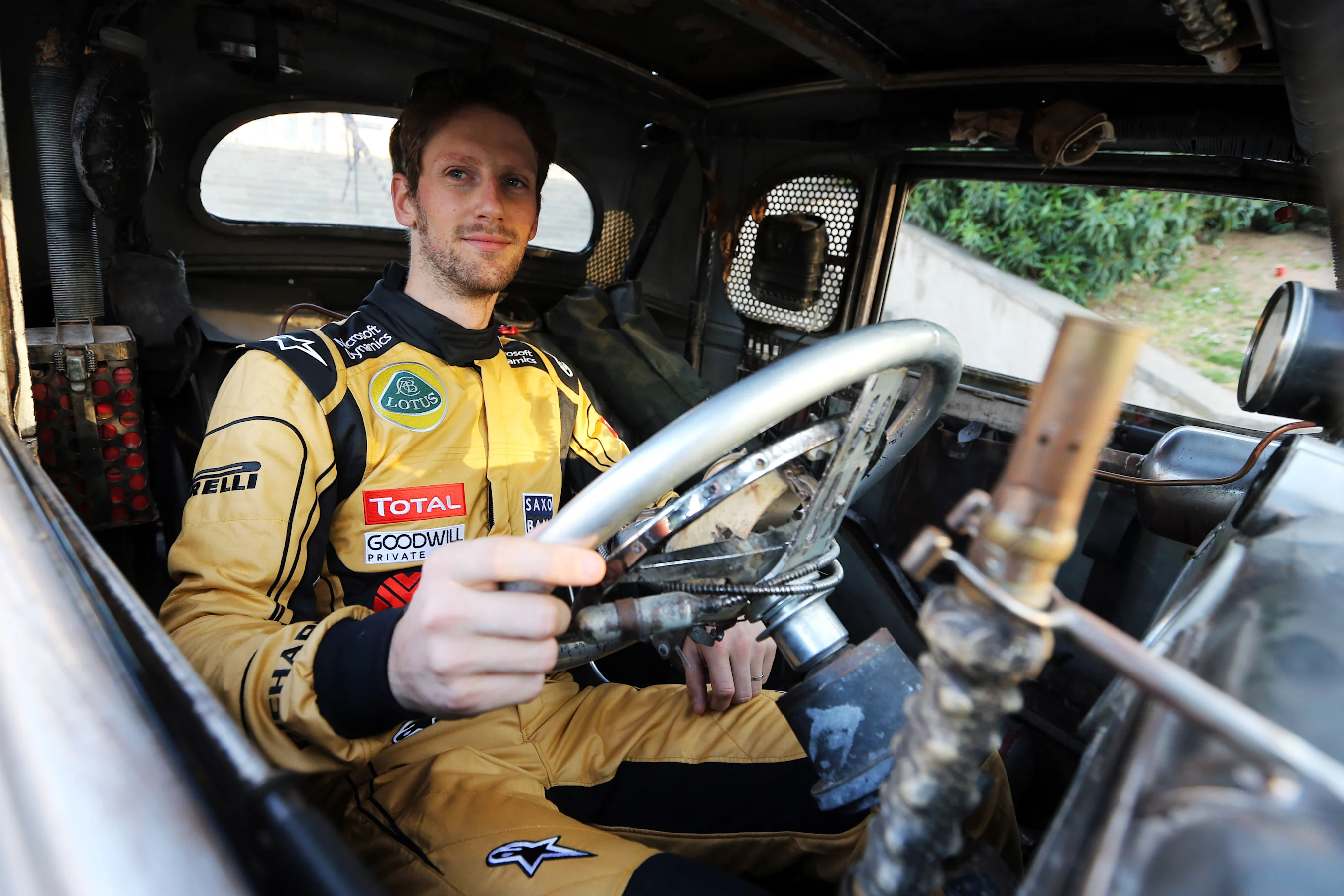 Romain Grosjean (FRA) Lotus F1 Team with special race overalls to promote the film Mad Max: Fury