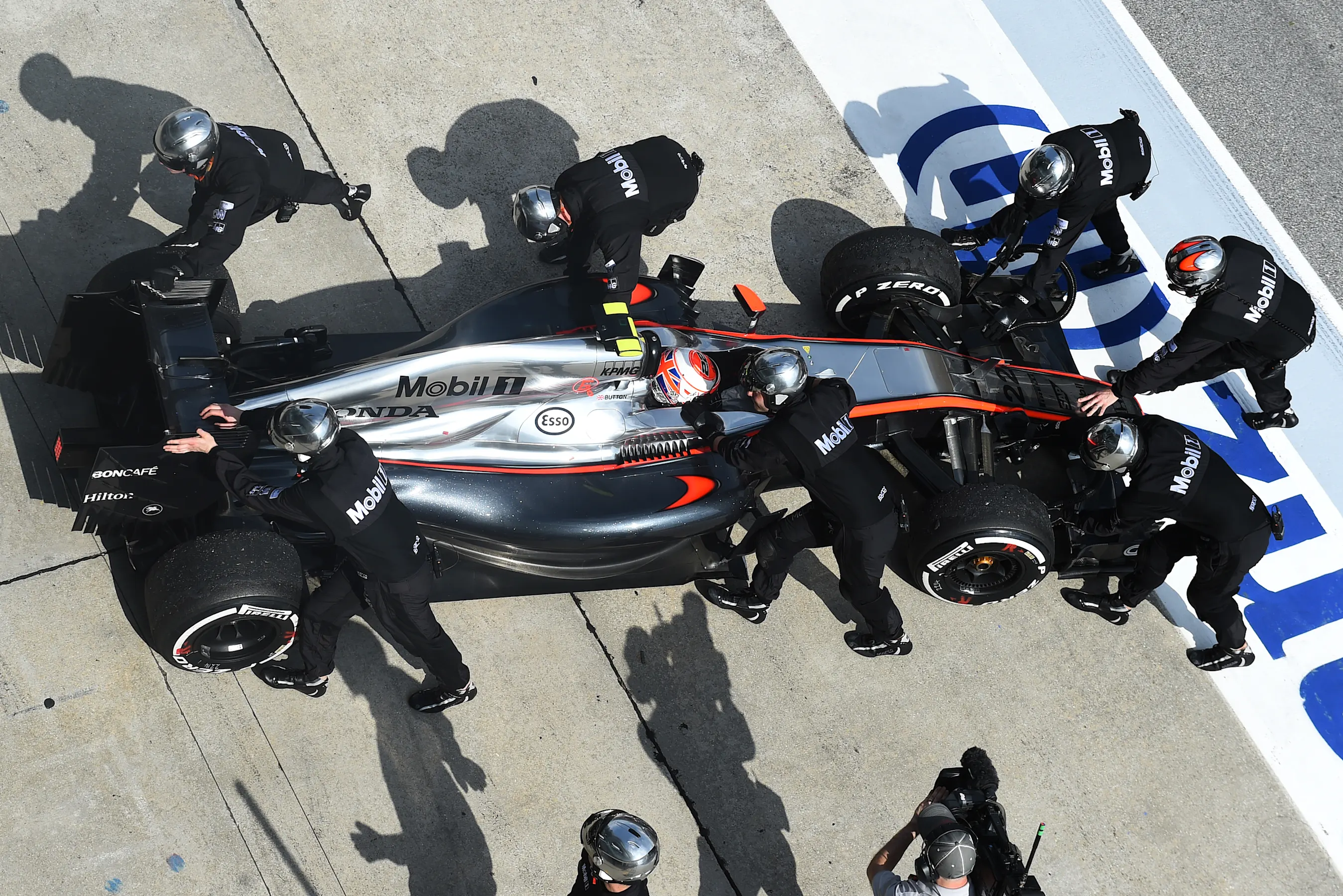 Jenson Button (GBR) McLaren retires from the race in the pits at Formula One World Championship,