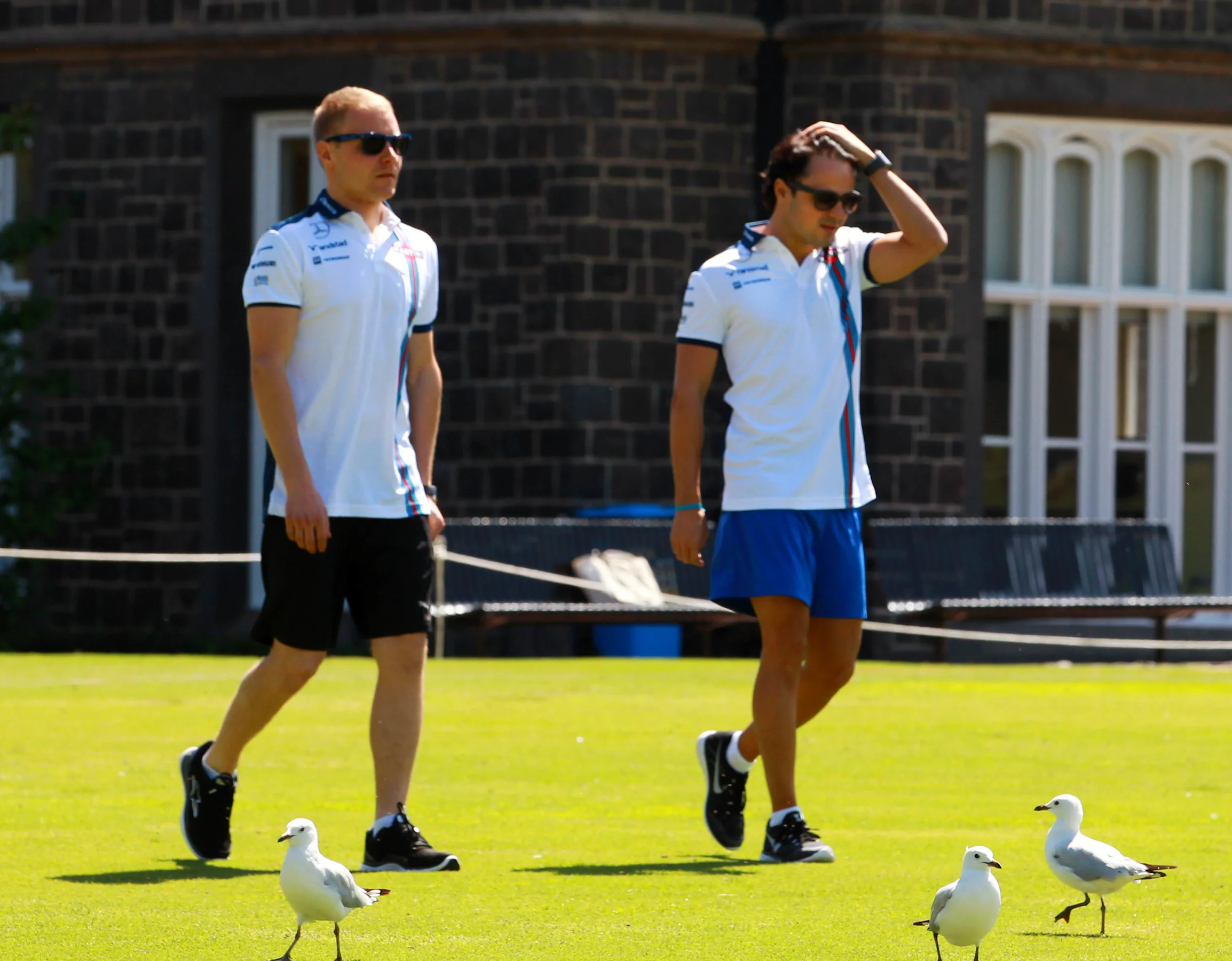Felipe Massa (BRA) Williams and Valtteri Bottas (FIN) Williams at an Aussie Rules skills session at