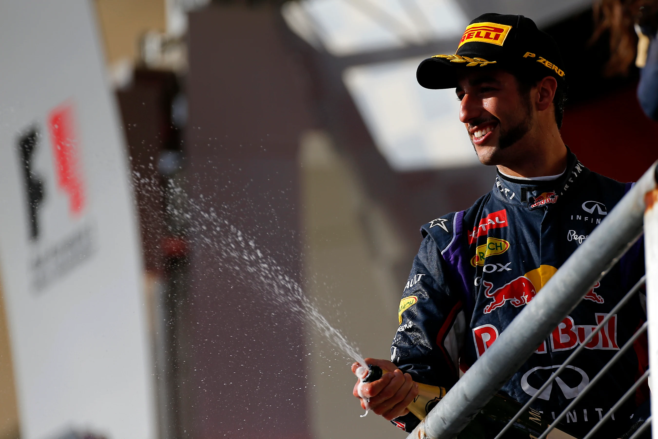 Third placed Daniel Ricciardo (AUS) Red Bull Racing sprays champagne On the podium. Formula One