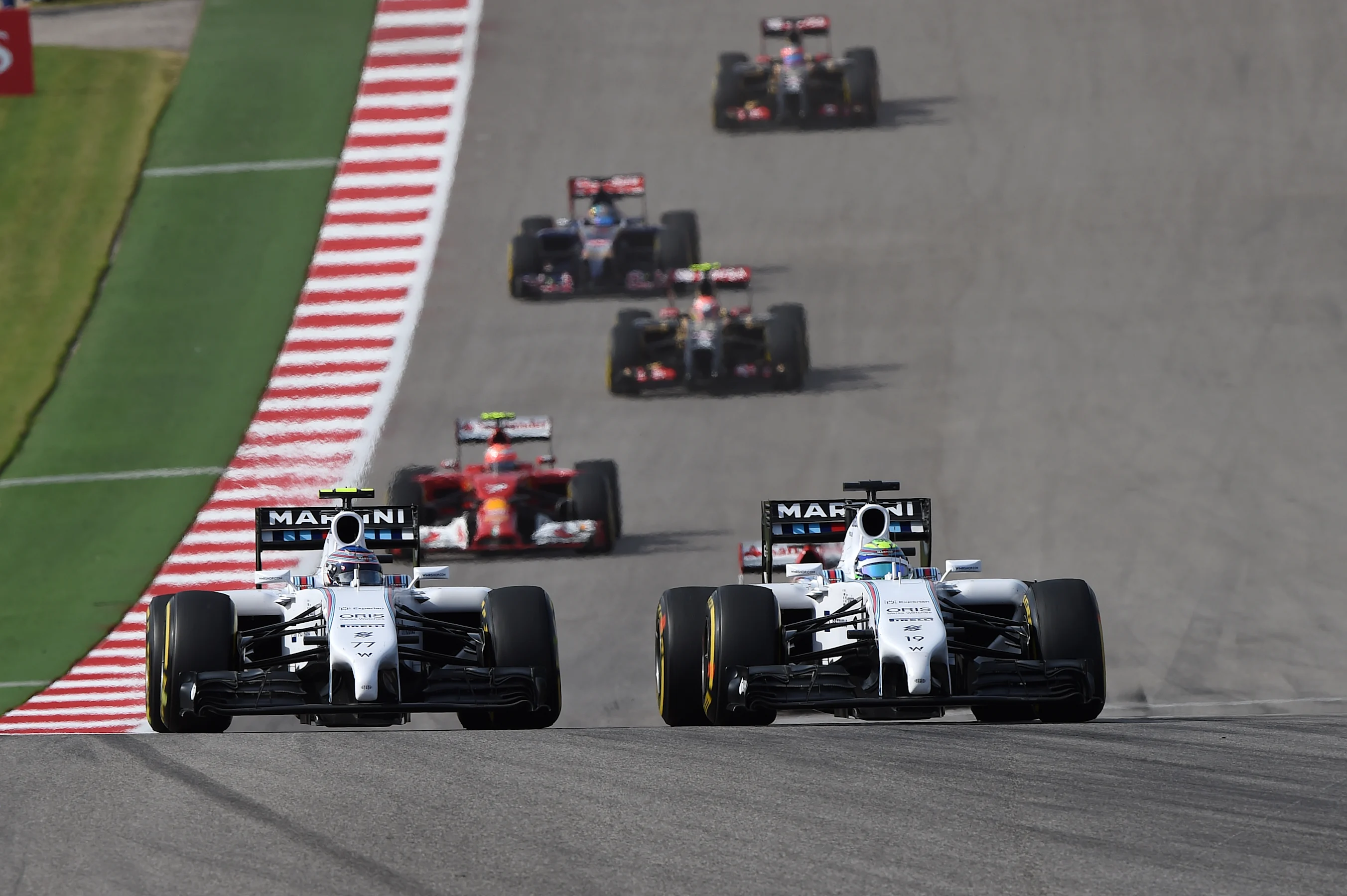 Valtteri Bottas (FIN) Williams FW36 and Felipe Massa (BRA) Williams FW36 battle. Formula One World