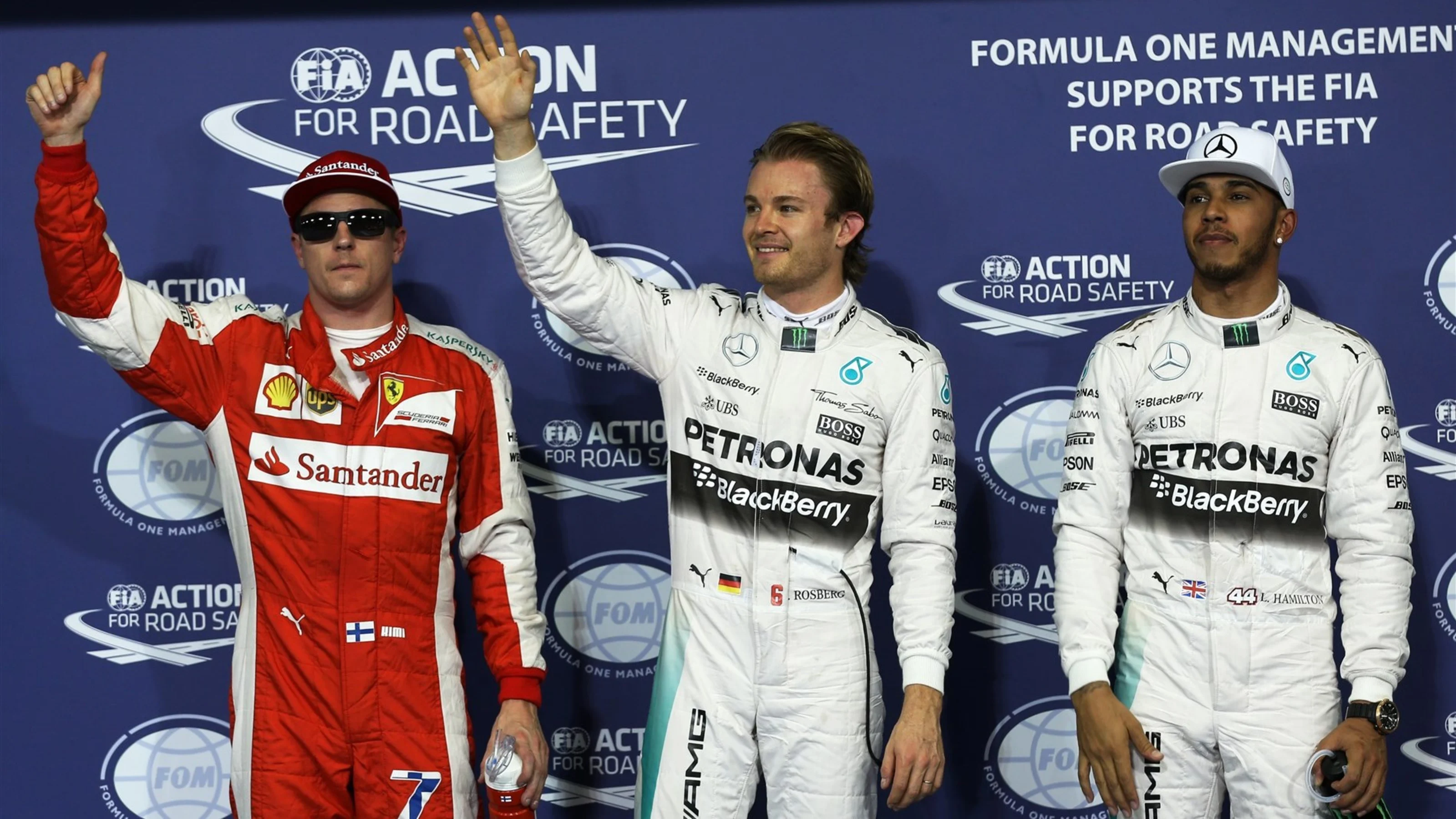 (L to R): Kimi Raikkonen (FIN) Ferrari, pole sitter Nico Rosberg (GER) Mercedes AMG F1 and Lewis