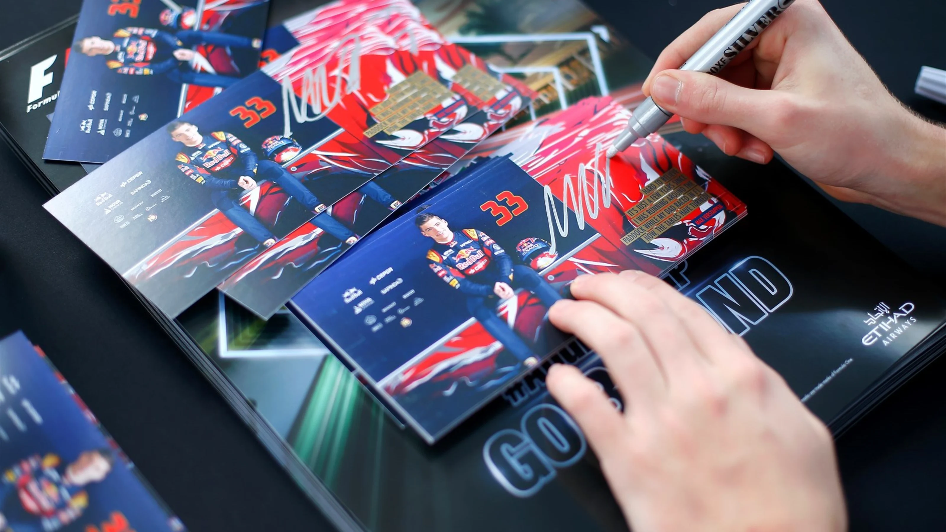 Max Verstappen (NDL) Scuderia Toro Rosso auotgraph cards at Formula One World Championship, Rd19,