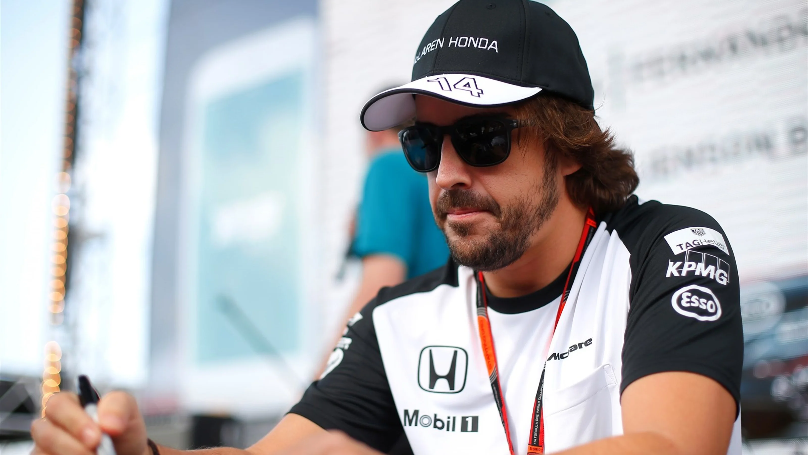 Fernando Alonso (ESP) McLaren at the autograph session at Formula One World Championship, Rd19, Abu