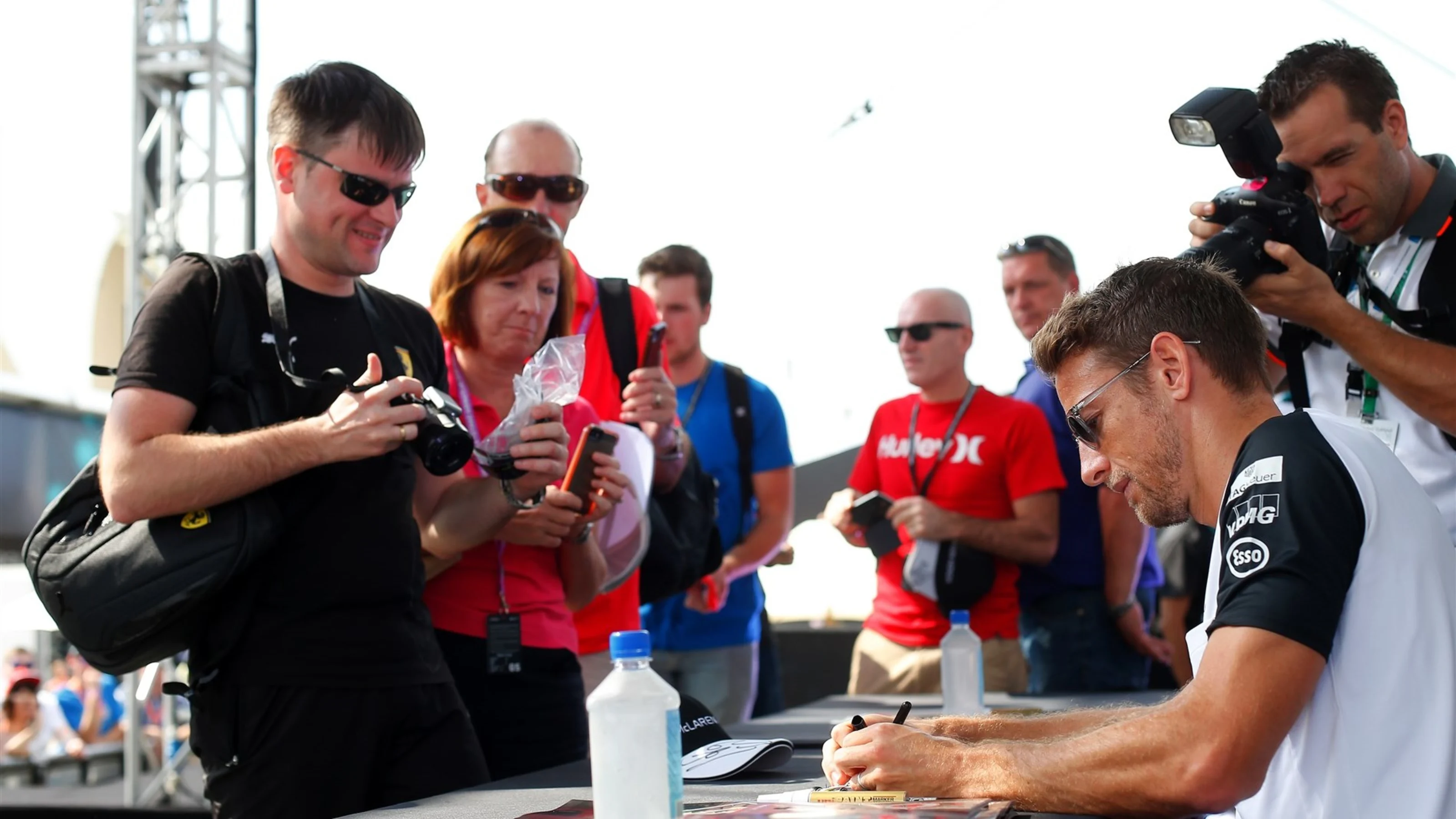 Jenson Button (GBR) McLaren at the autograph session at Formula One World Championship, Rd19, Abu