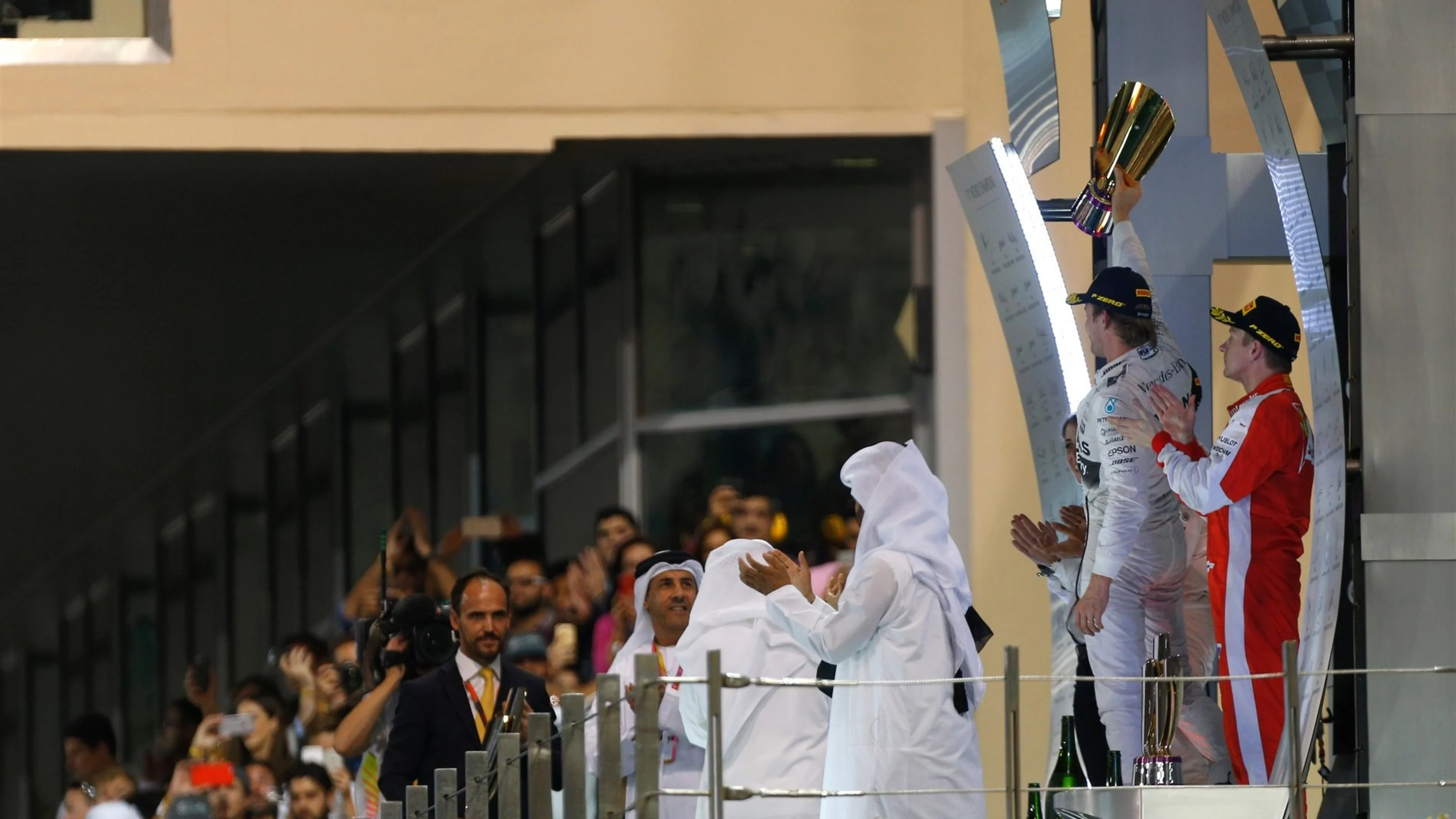 Race winner Nico Rosberg (GER) Mercedes AMG F1, Lewis Hamilton (GBR) Mercedes AMG F1 and Kimi
