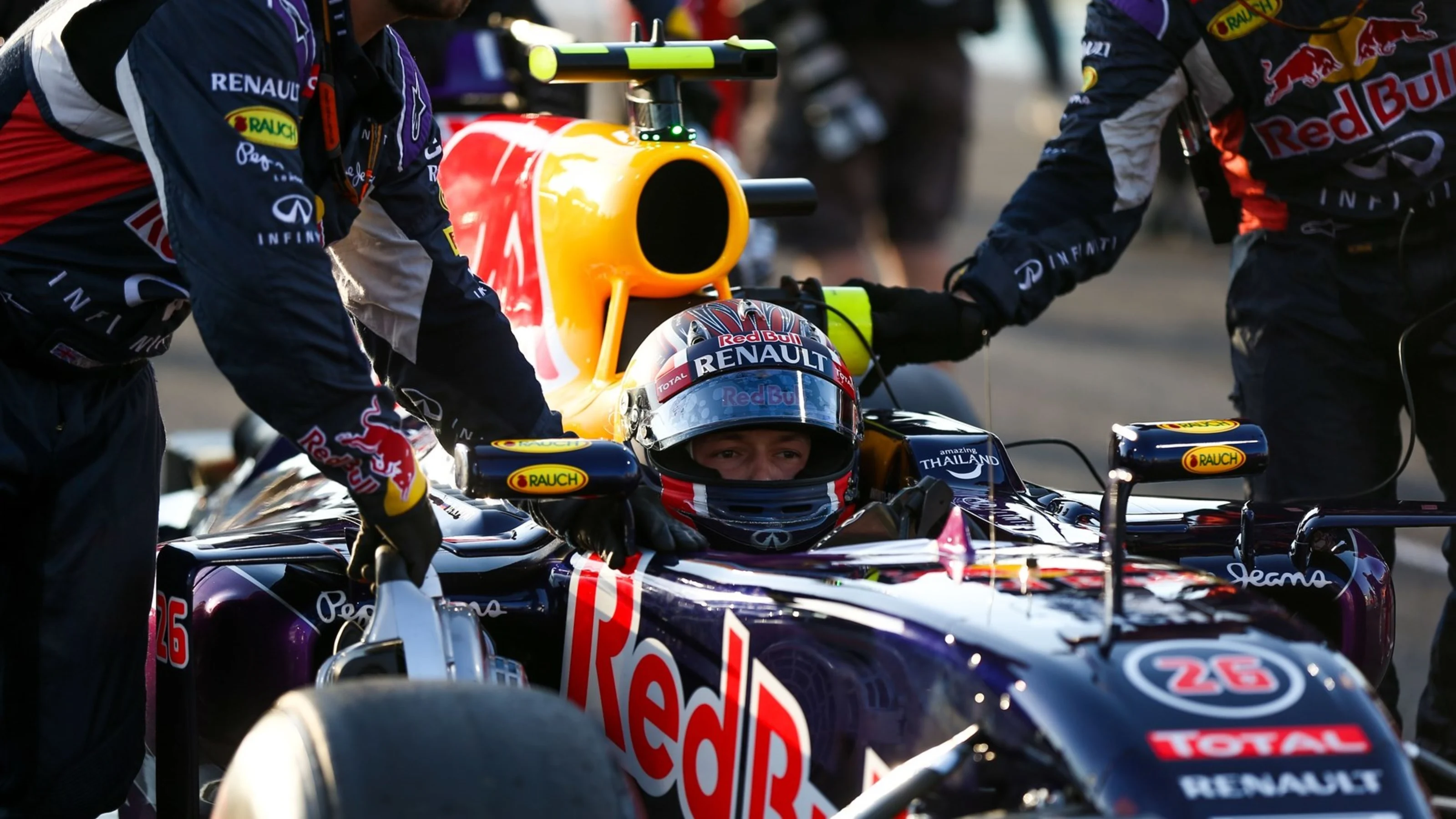 Daniil Kvyat (RUS) Red Bull Racing RB11 on the grid at Formula One World Championship, Rd19, Abu