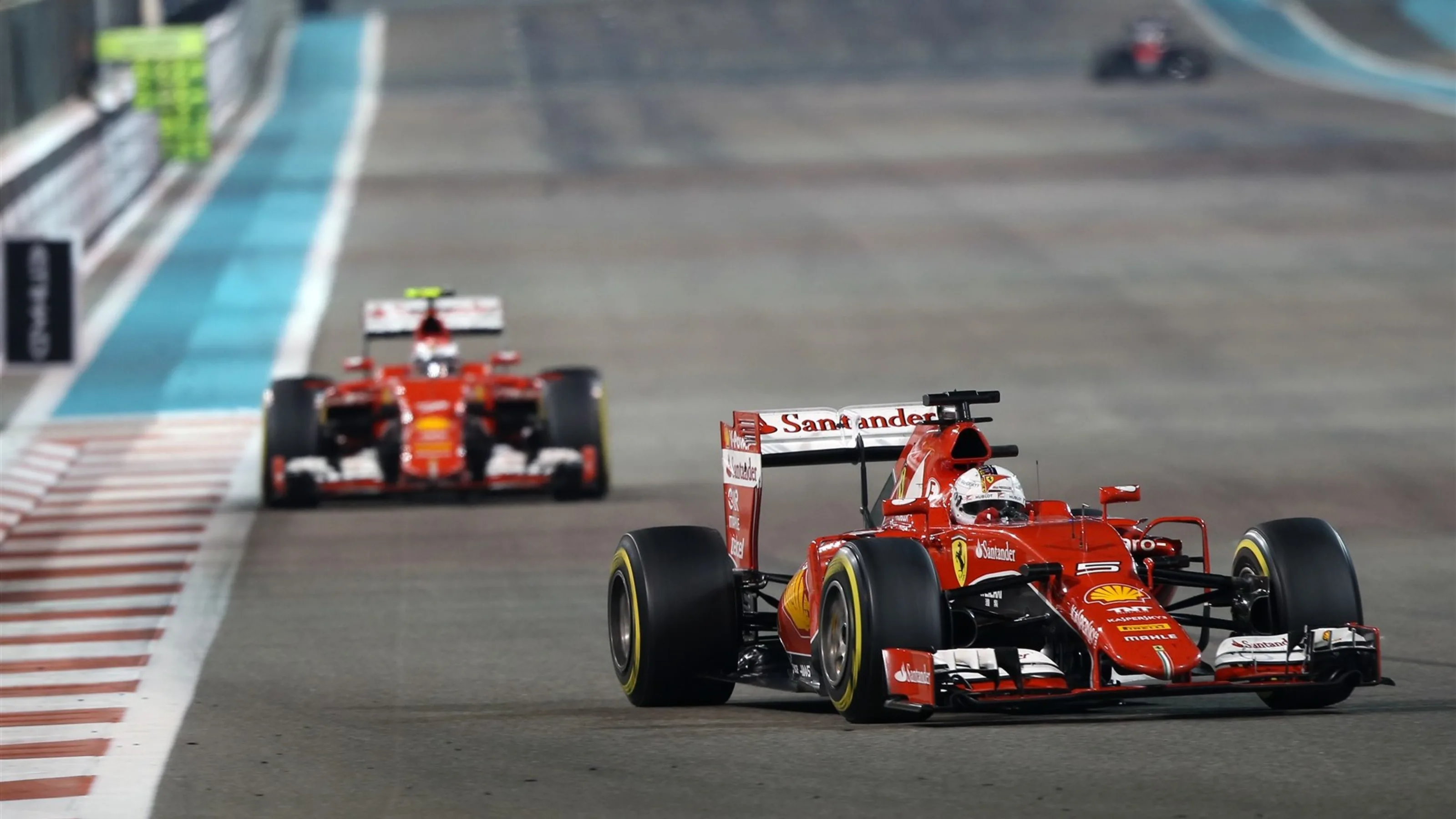 Sebastian Vettel (GER) Ferrari SF15-T leads Kimi Raikkonen (FIN) Ferrari SF15-T at Formula One