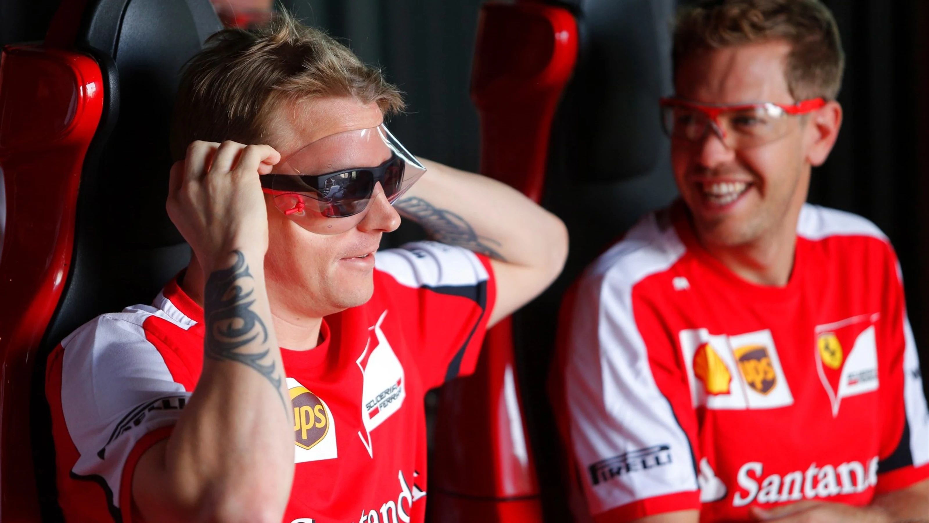 Kimi Raikkonen (FIN) Ferrari and Sebastian Vettel (GER) Ferrari on the rollercoaster at Ferrari