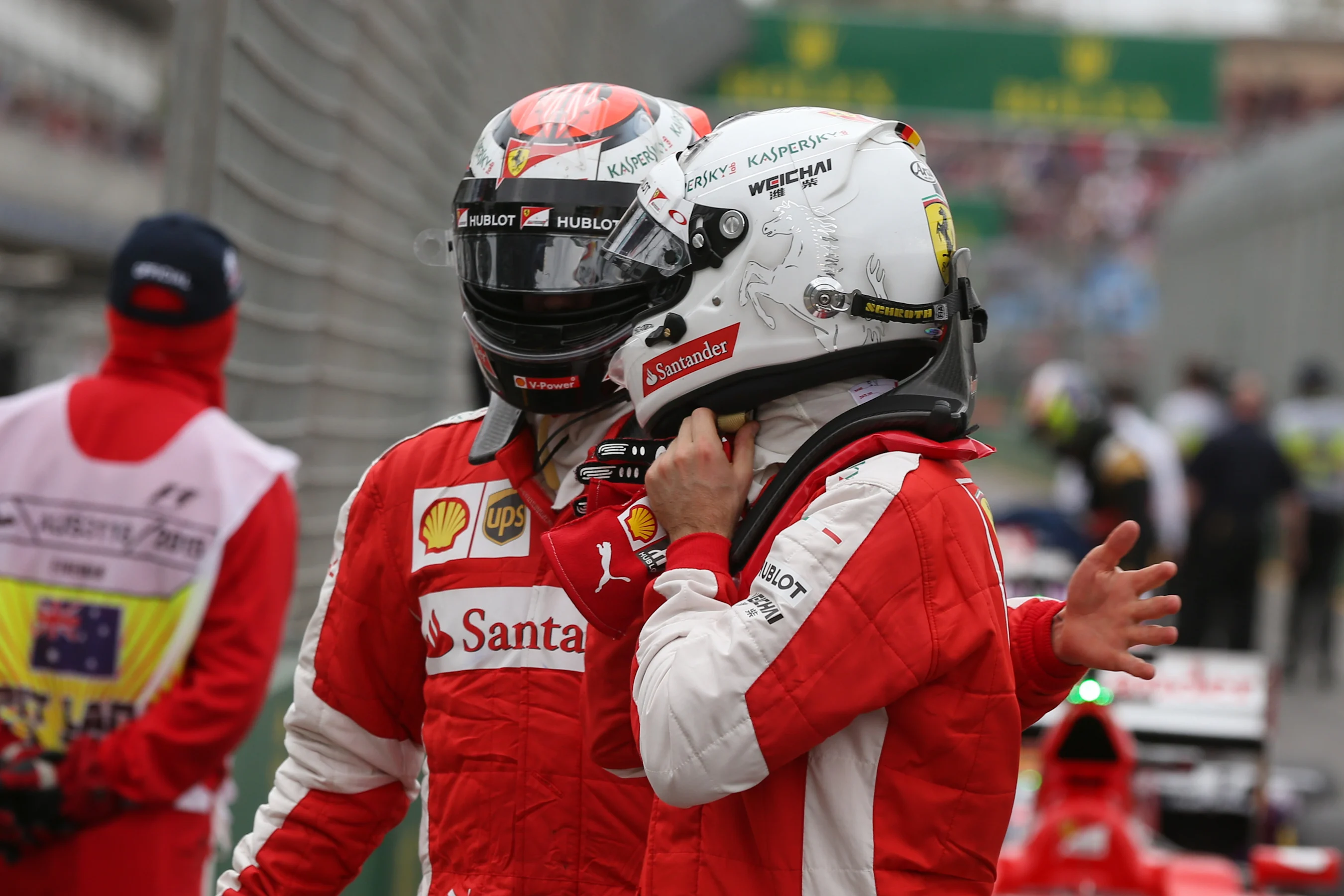 (L-R) Kimi Raikkonen (FIN) Ferrari and Sebastian Vettel (GER) Ferrari in parc ferme at Formula One