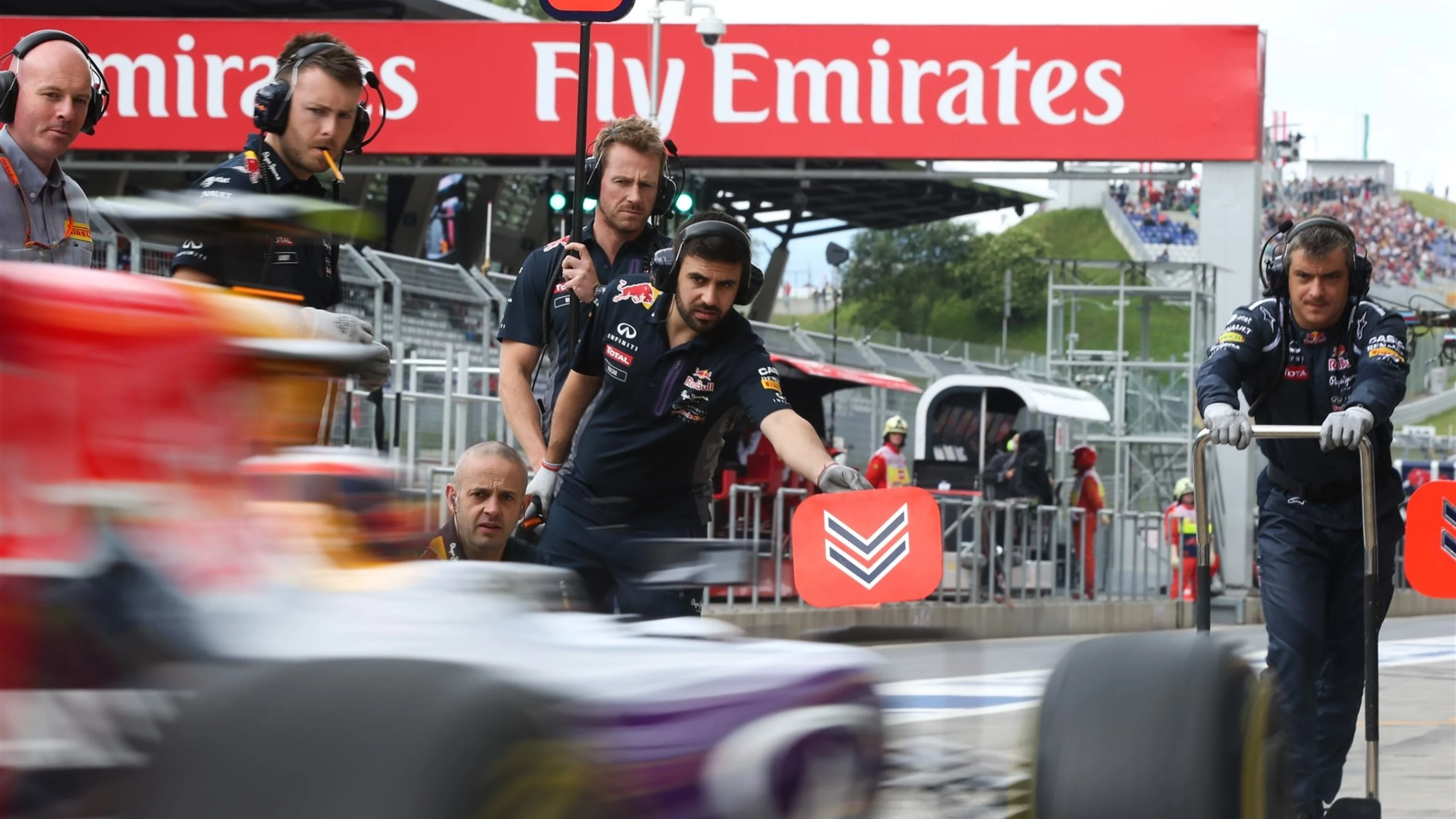 Daniel Ricciardo (AUS) Red Bull Racing RB11 pit stop at Formula One World Championship, Rd8,