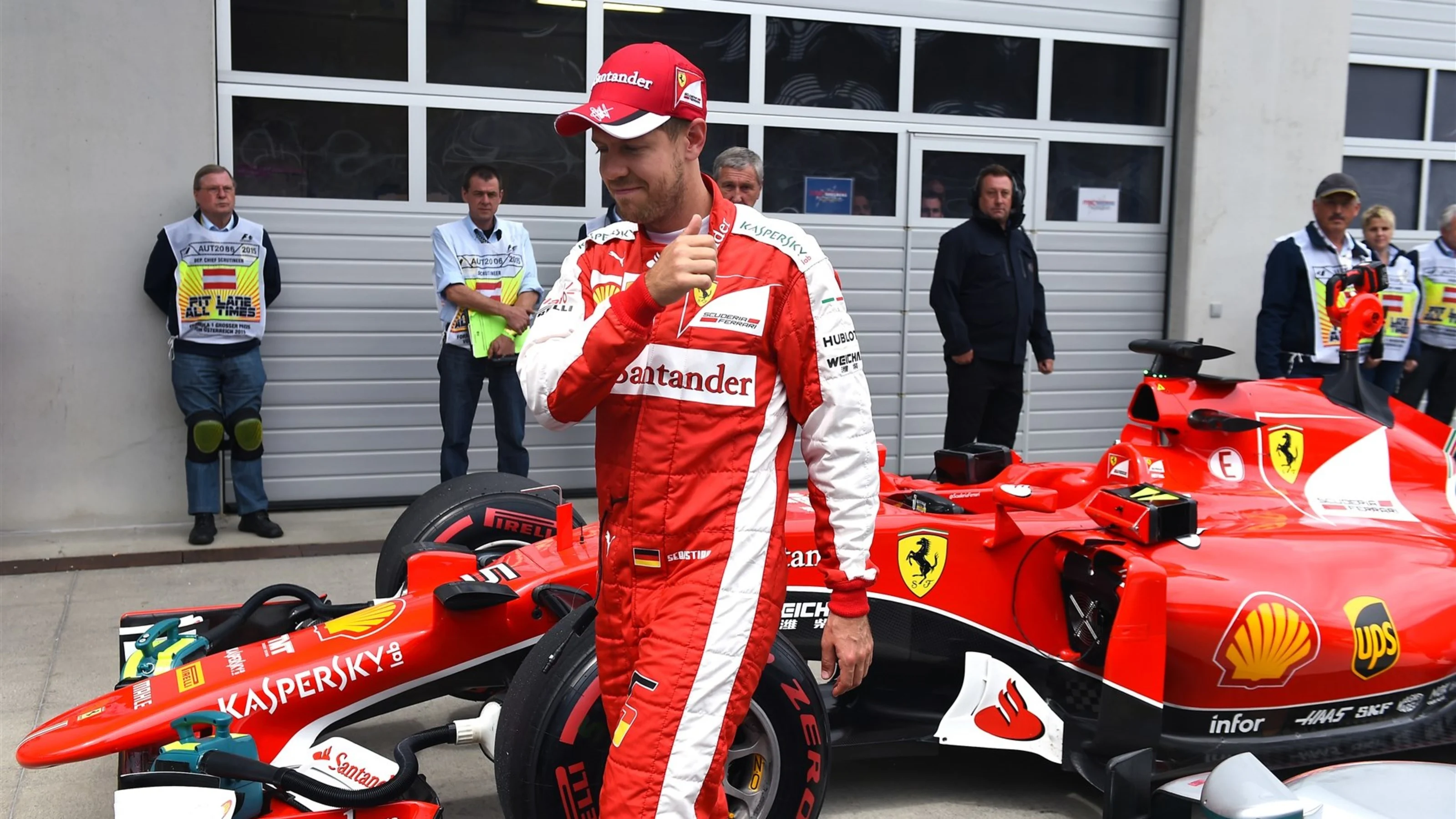 Sebastian Vettel (GER) Ferrari in parc ferme at Formula One World Championship, Rd8, Austrian Grand