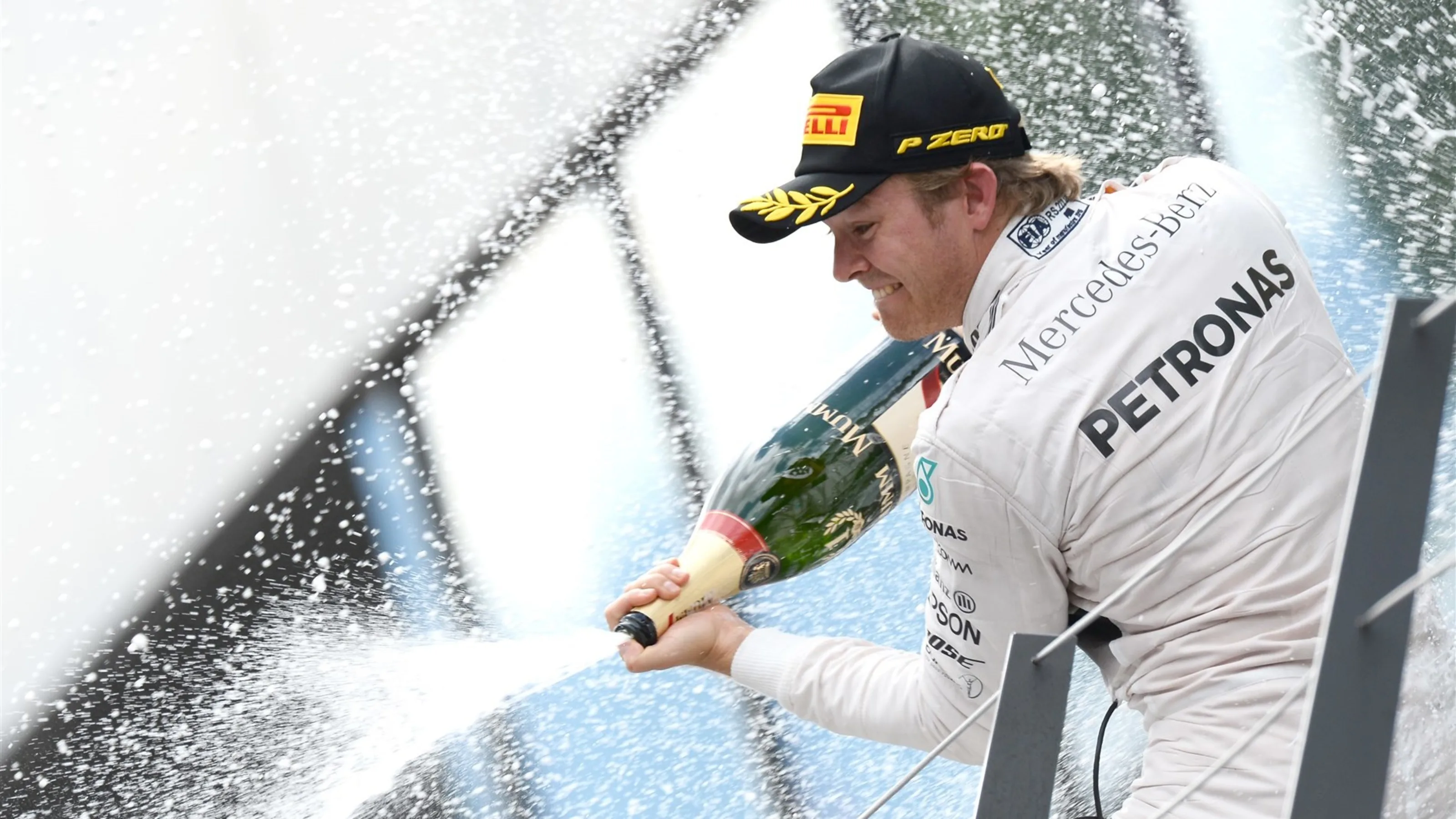Nico Rosberg (GER) Mercedes AMG F1 celebrates with champagne on the podium at Formula One World