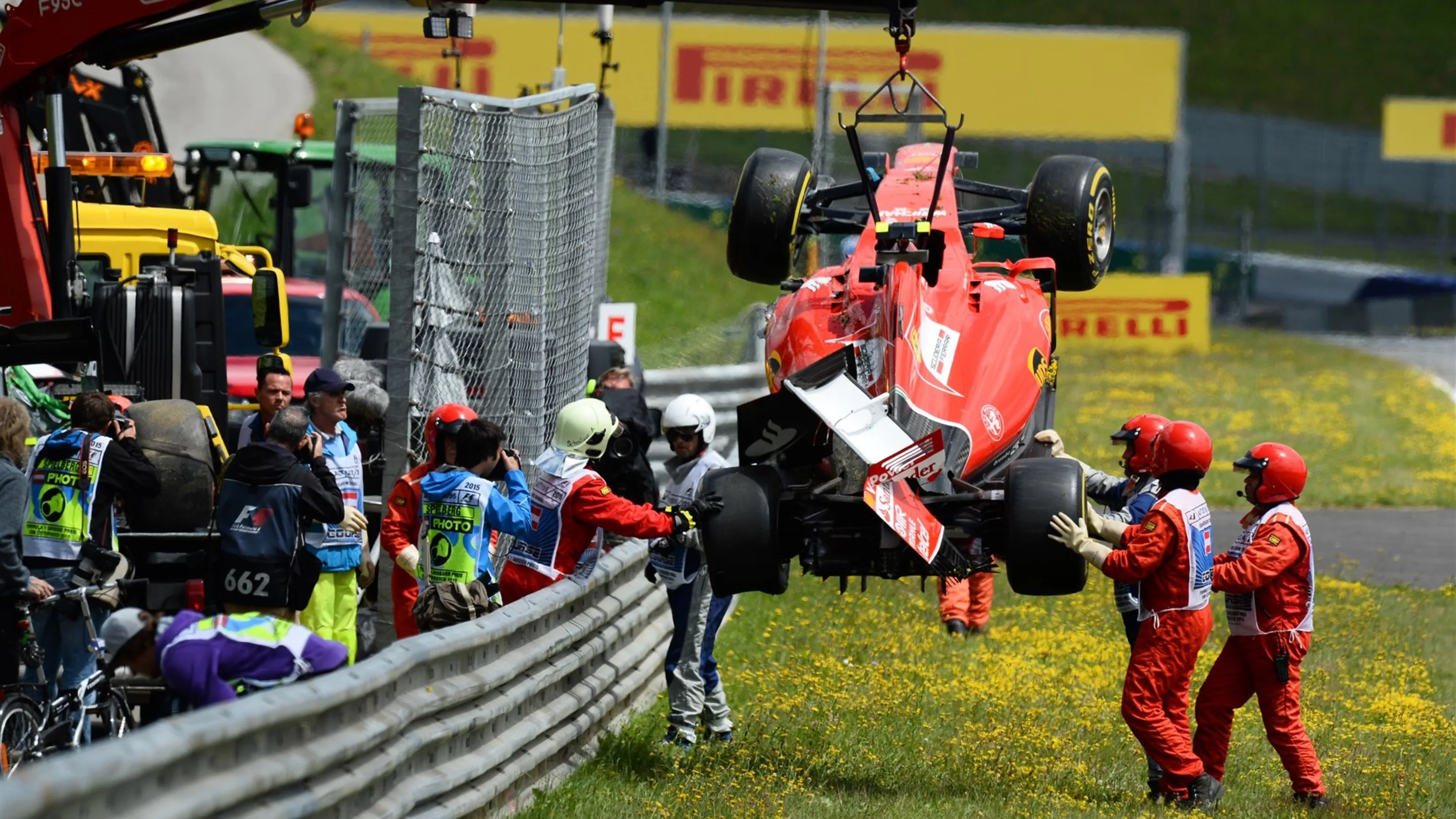 The crashed car Kimi Raikkonen (FIN) Ferrari SF15-T being recovered at Formula One World