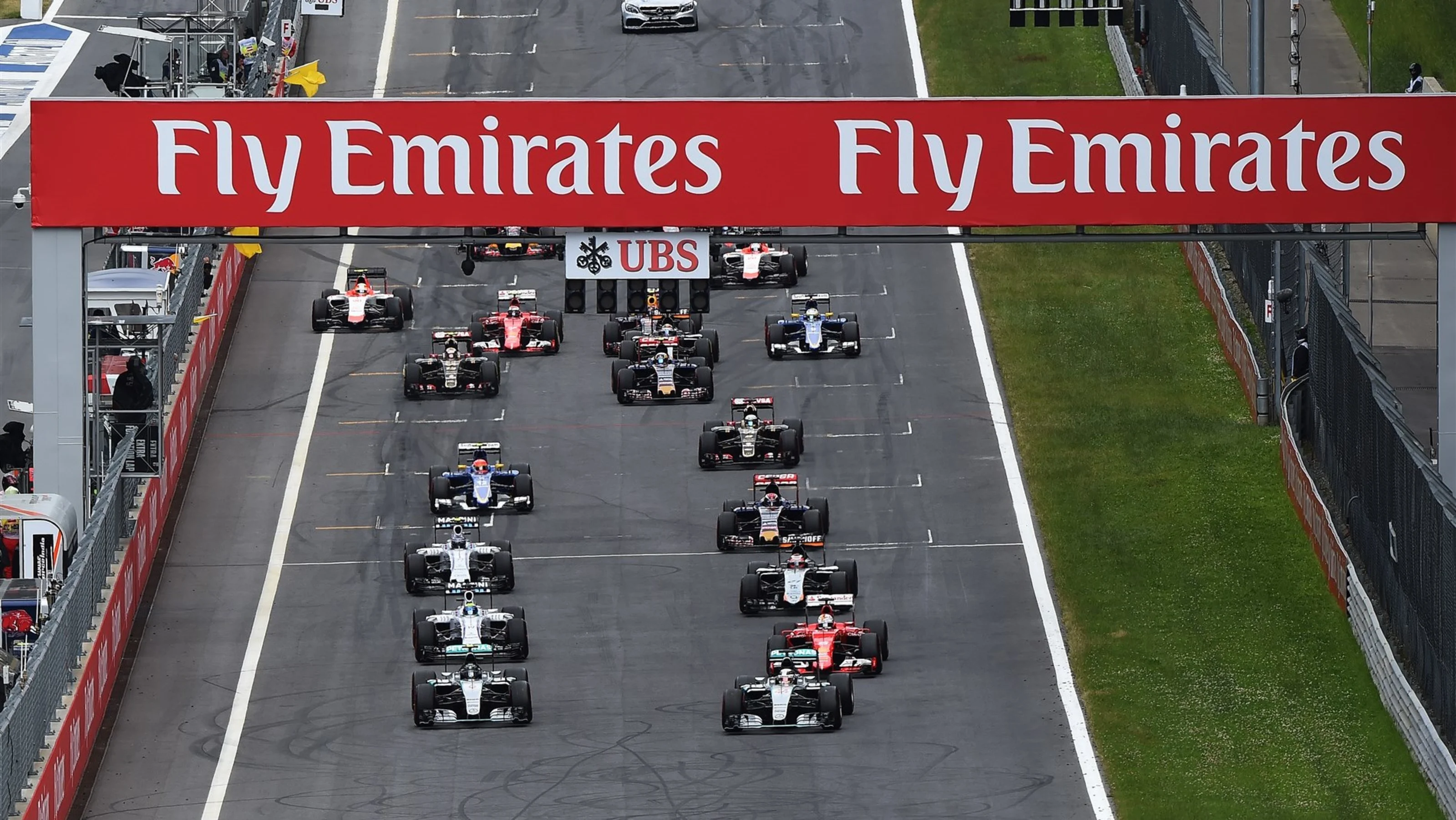 Lewis Hamilton (GBR) Mercedes AMG F1 W06 leads Nico Rosberg (GER) Mercedes AMG F1 W06 at the start