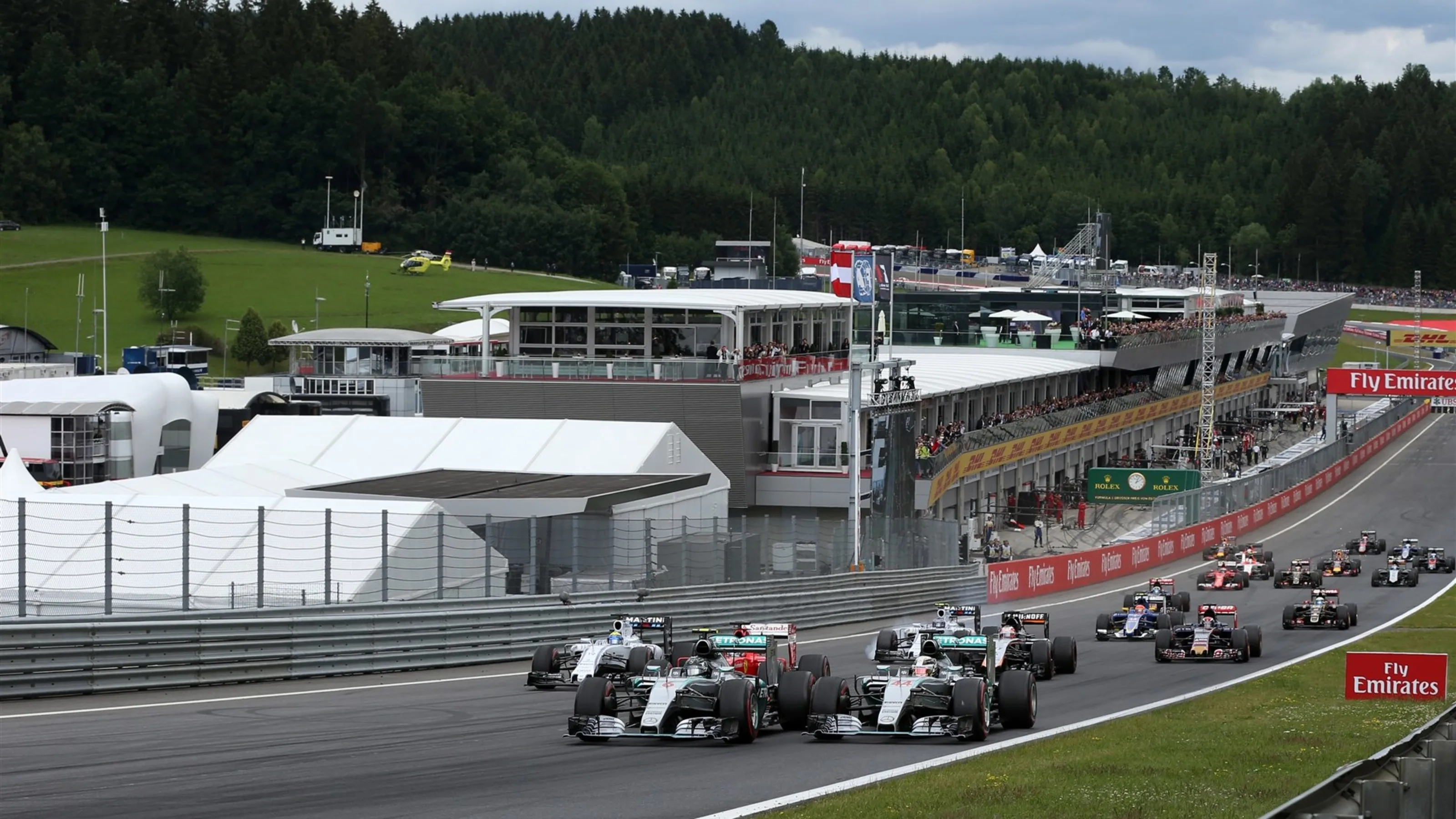 Nico Rosberg (GER) Mercedes AMG F1 W06 and Lewis Hamilton (GBR) Mercedes AMG F1 W06 at the start of