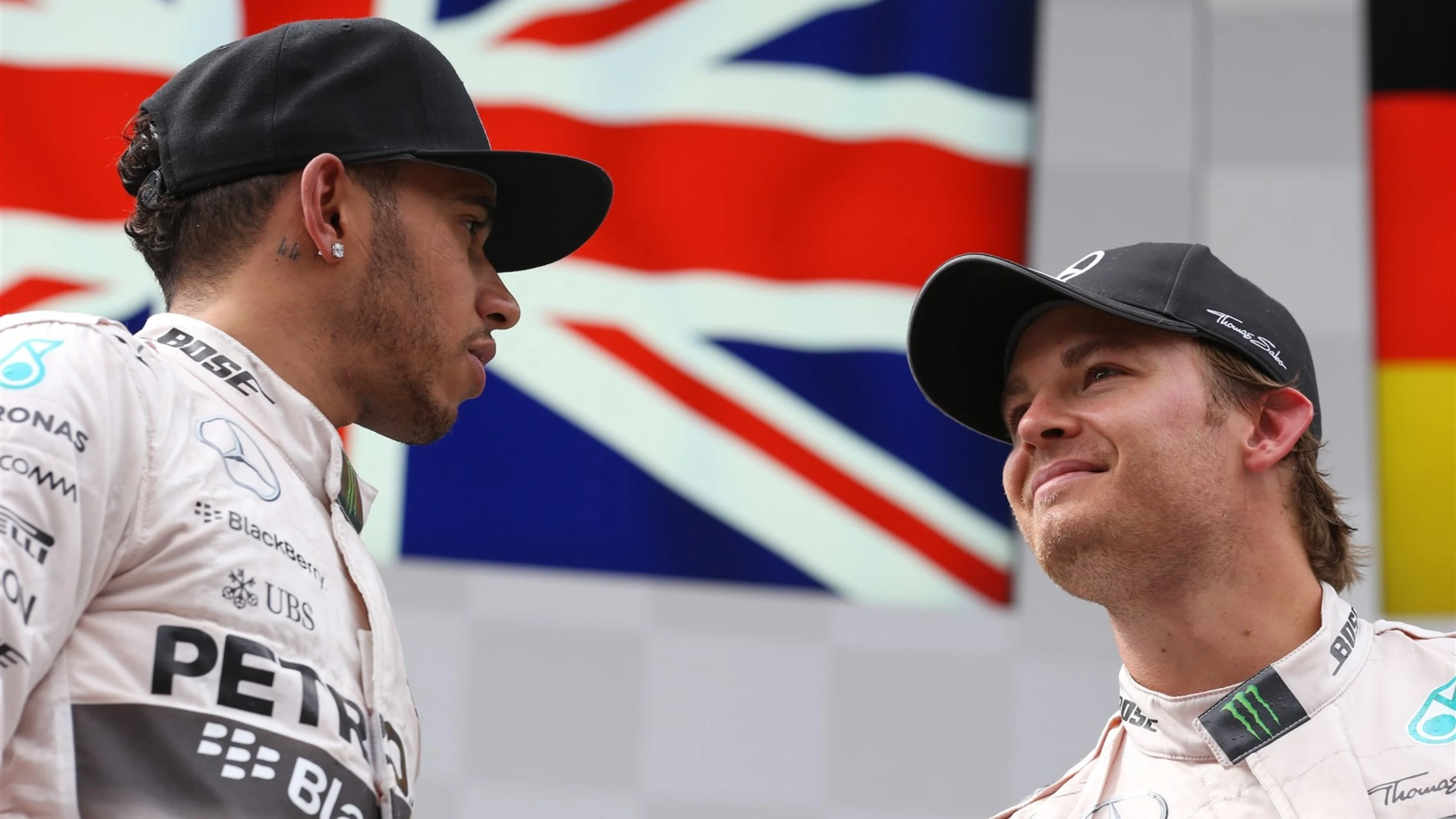 Nico Rosberg (GER) Mercedes AMG F1 and Lewis Hamilton (GBR) Mercedes AMG F1 on the podium at