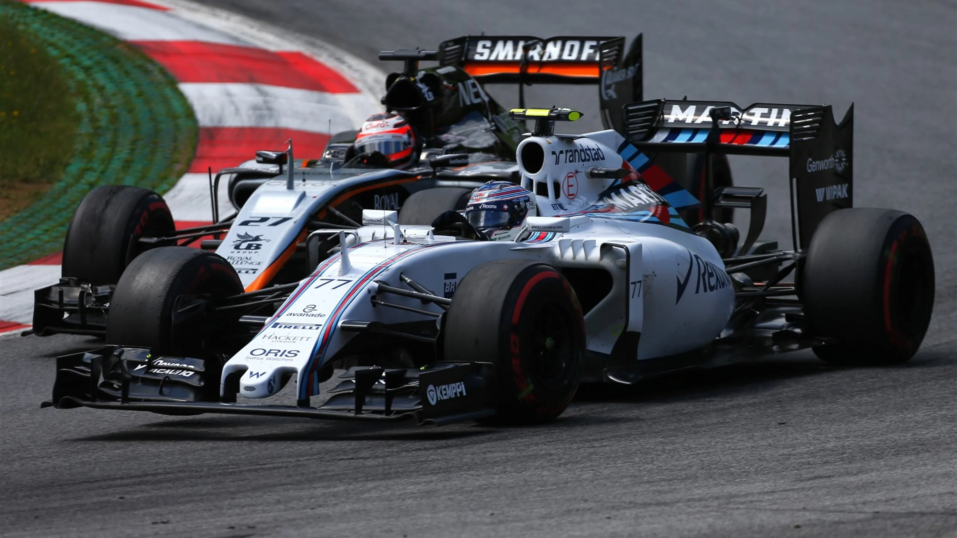 Valtteri Bottas (FIN) Williams FW37 and Nico Hulkenberg (GER) Force India VJM08 battle at Formula