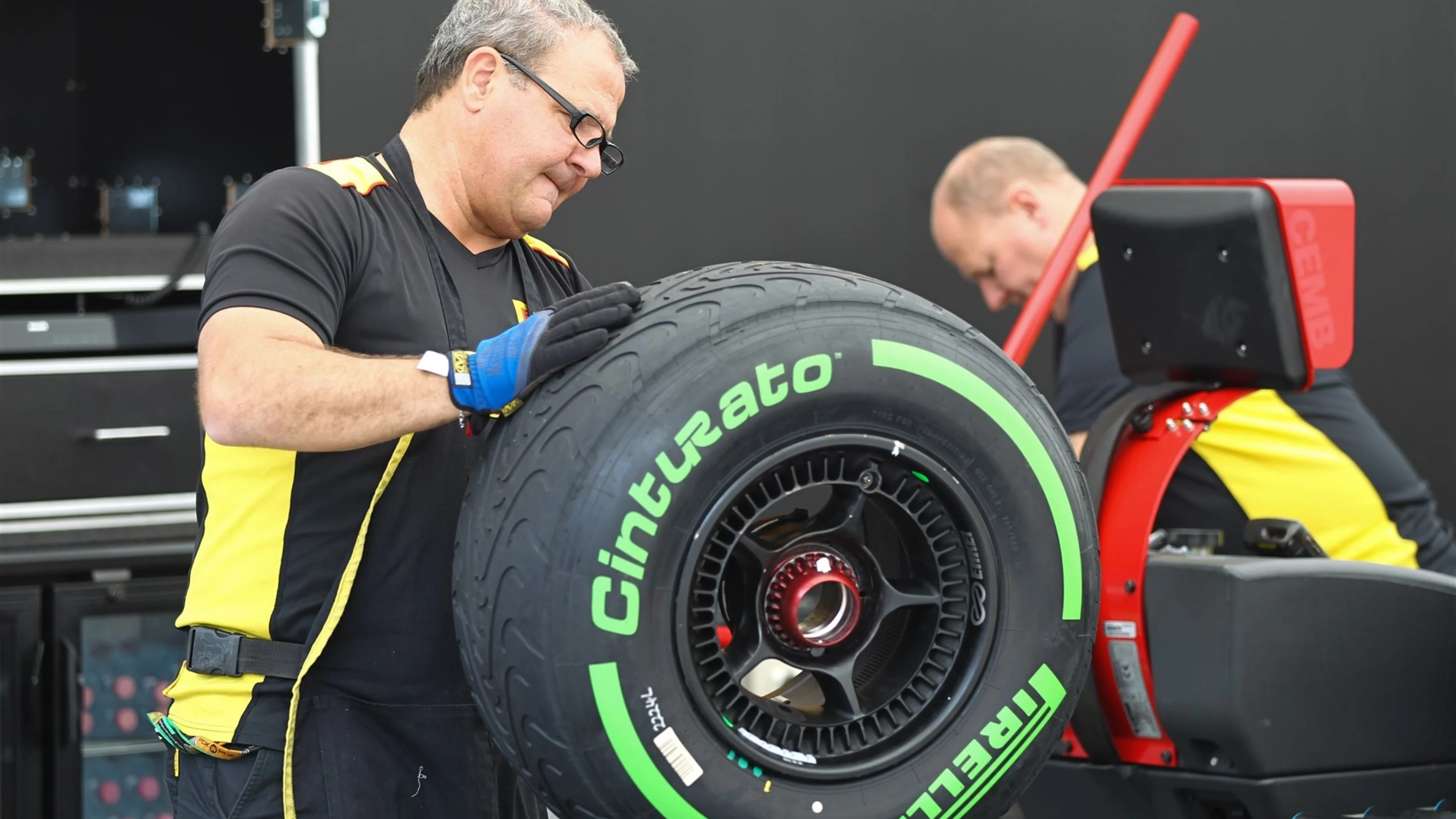 Pirelli engineers with green colored intermediates tyres at Formula One World Championship, Rd8,