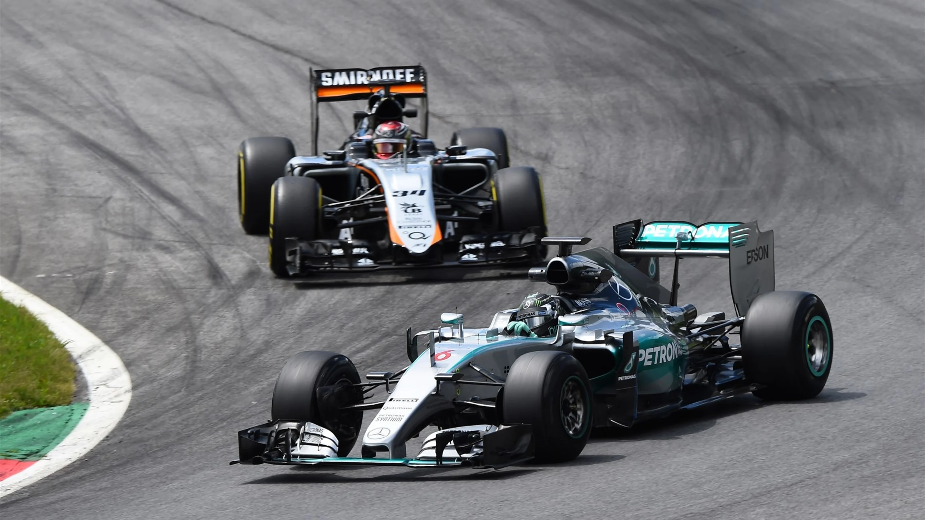 Nico Rosberg (GER) Mercedes AMG F1 W06 and Pascal Wehrlein (GER) Force India VJM08 at Formula One