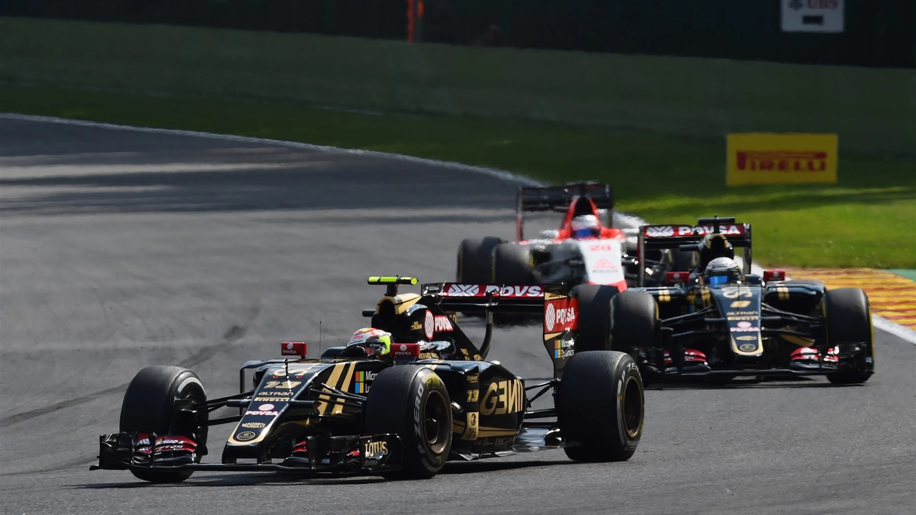 Pastor Maldonado (VEN) Lotus E23 Hybrid leads team-mate Romain Grosjean (FRA) Lotus E23 Hybrid at