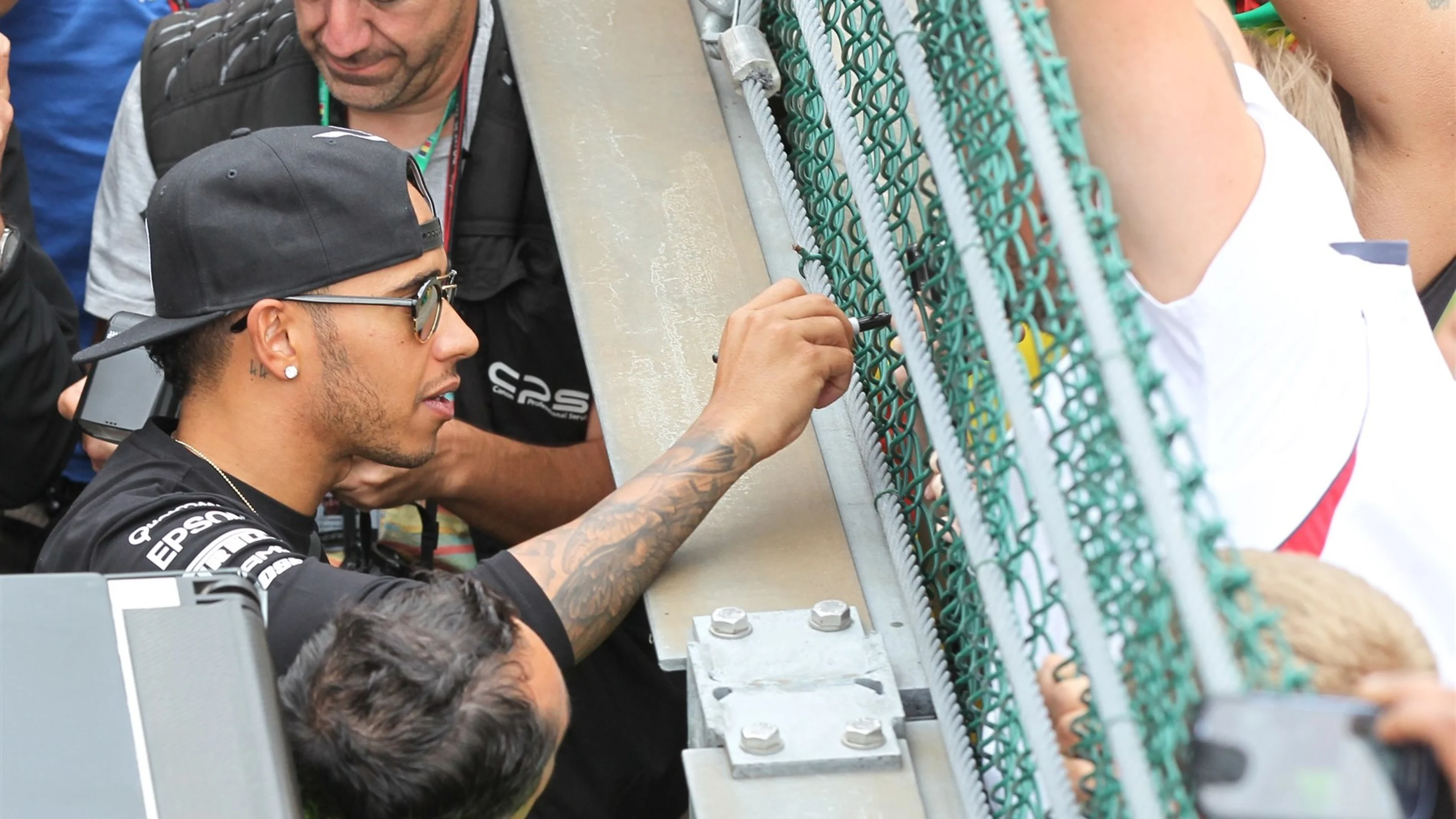 Lewis Hamilton (GBR) Mercedes AMG F1 signs autographs for fans at Formula One World Championship,