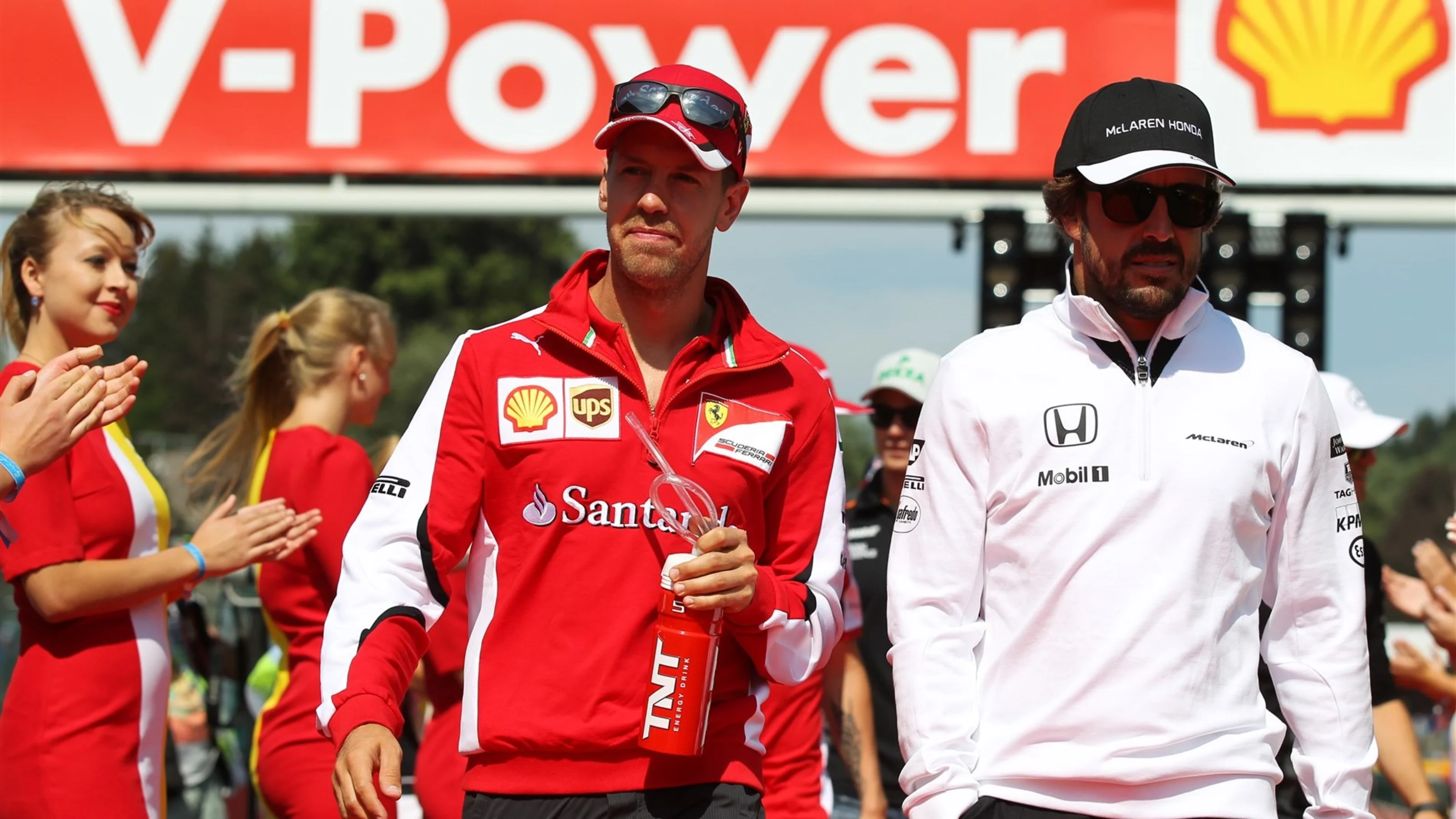 Sebastian Vettel (GER) Ferrari and Fernando Alonso (ESP) McLaren at the drivers parade at Formula