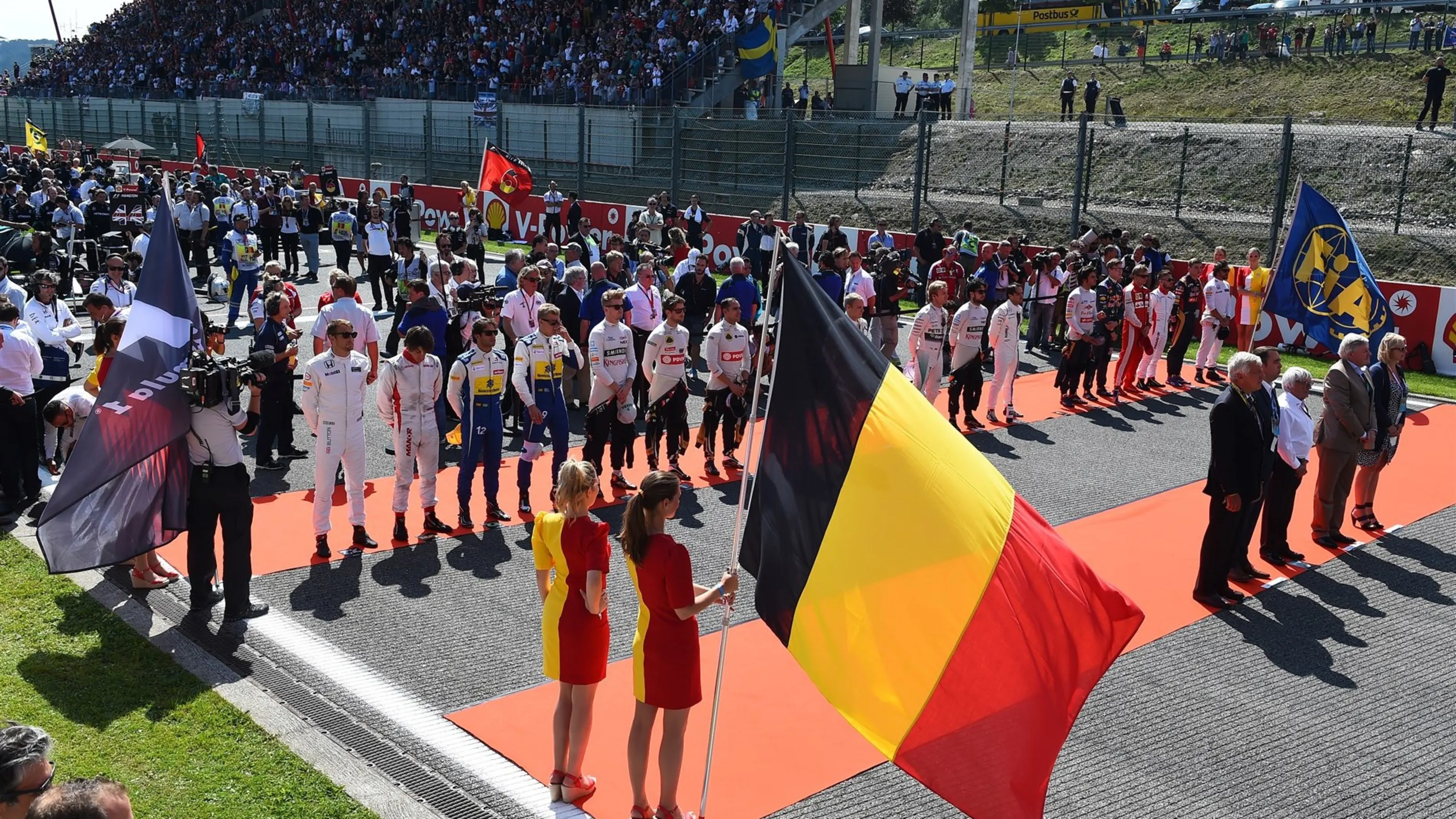 Drivers observe the National Anthem on the grid at Formula One World Championship, Rd11, Belgian