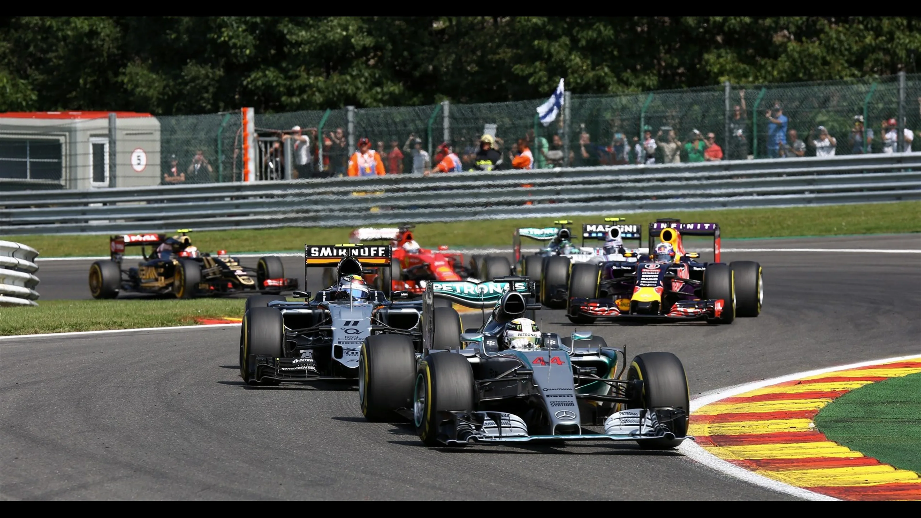 Lewis Hamilton (GBR) Mercedes AMG F1 W06 leads Sergio Perez (MEX) Force India VJM08 at the start of