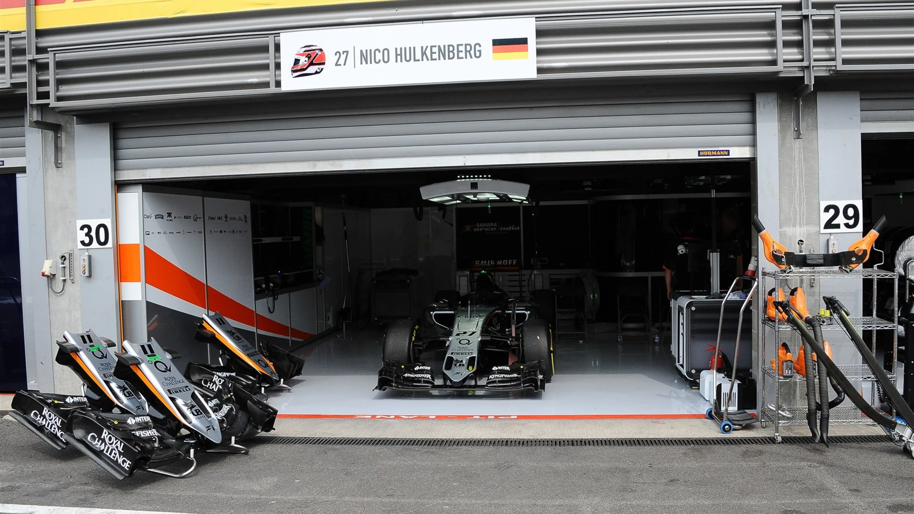 The car of race retiree Nico Hulkenberg (GER) Force India VJM08 in the garage at Formula One World