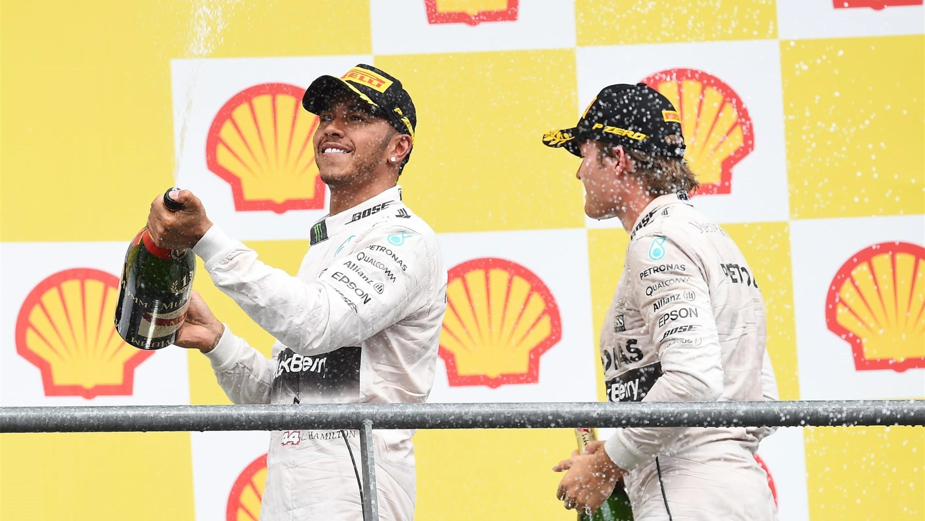 Lewis Hamilton (GBR) Mercedes AMG F1 and Nico Rosberg (GER) Mercedes AMG F1 celebrate on the podium
