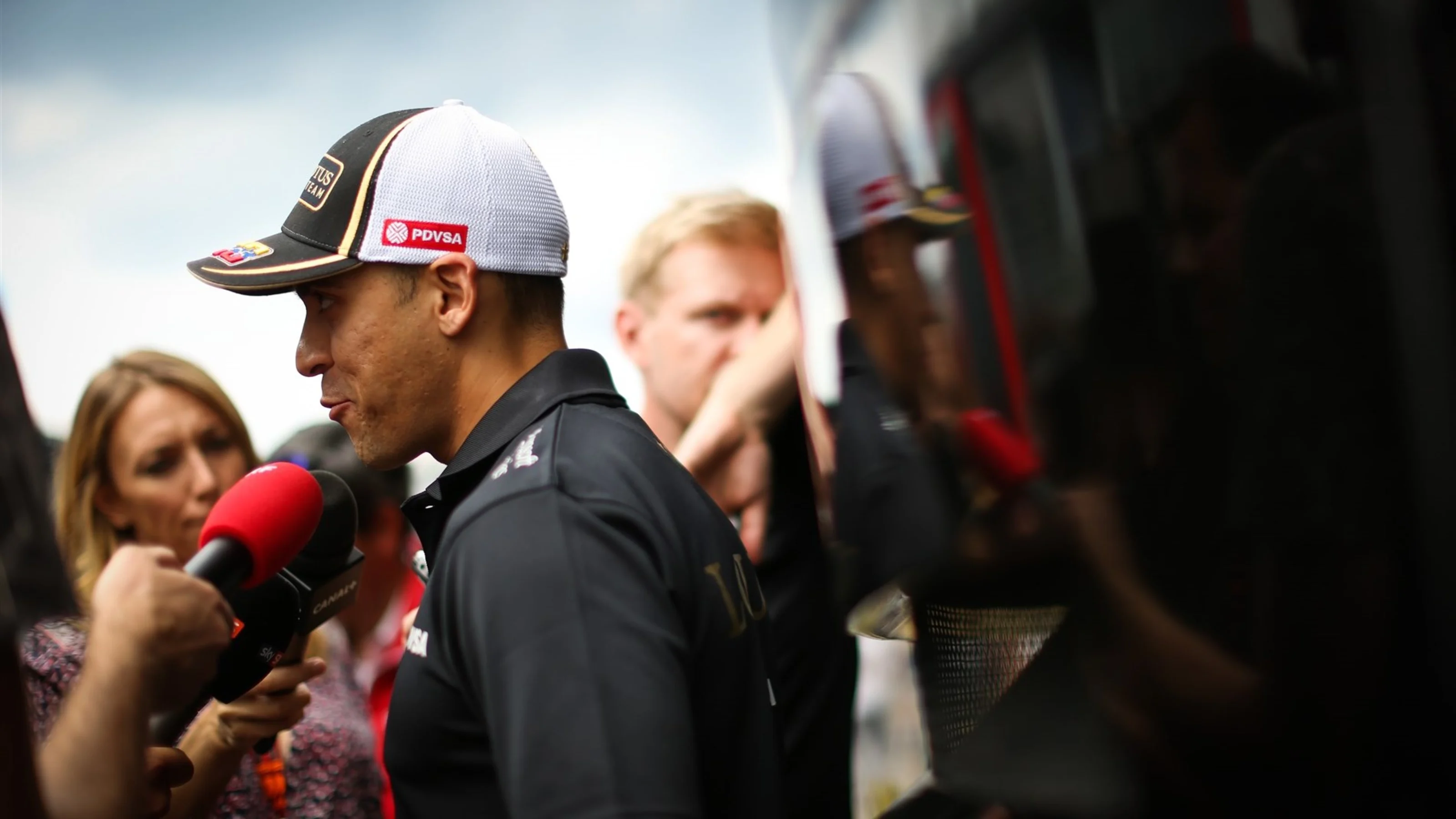 Pastor Maldonado (VEN) Lotus talks with the media at Formula One World Championship, Rd11, Belgian