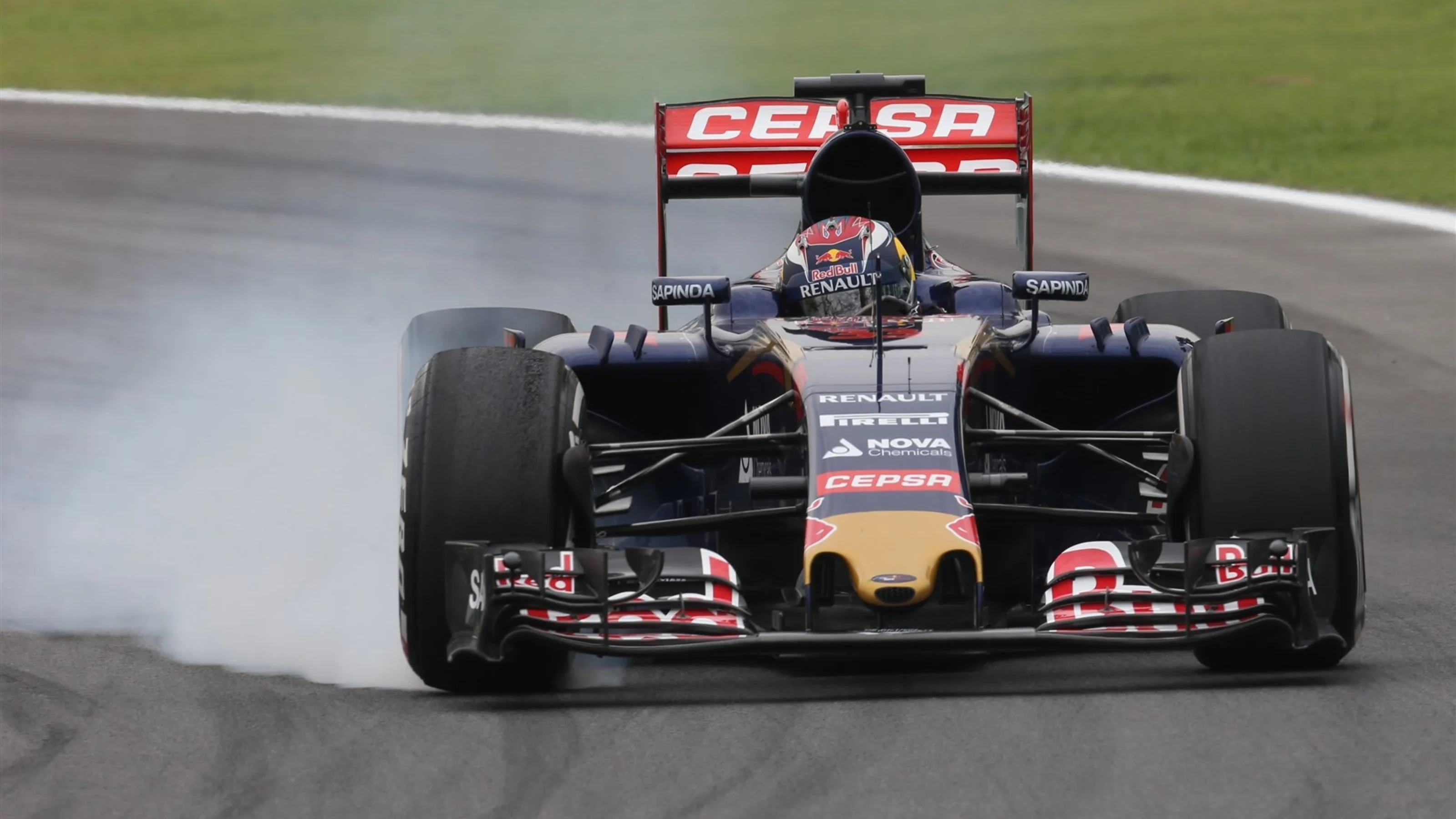 Max Verstappen (NDL) Scuderia Toro Rosso STR10 locks up at Formula One World Championship, Rd18,