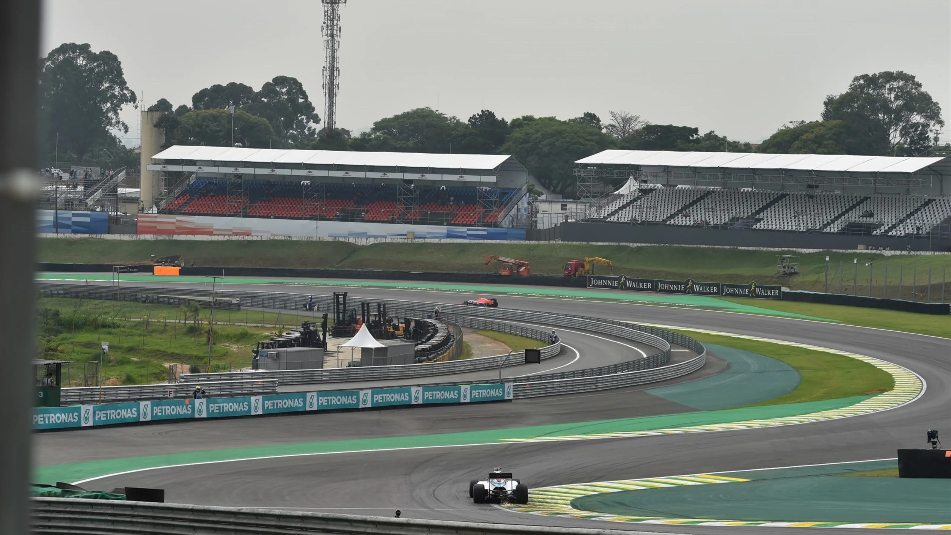 Felipe Massa (BRA) Williams FW37 and sparks at Formula One World Championship, Rd18, Brazilian