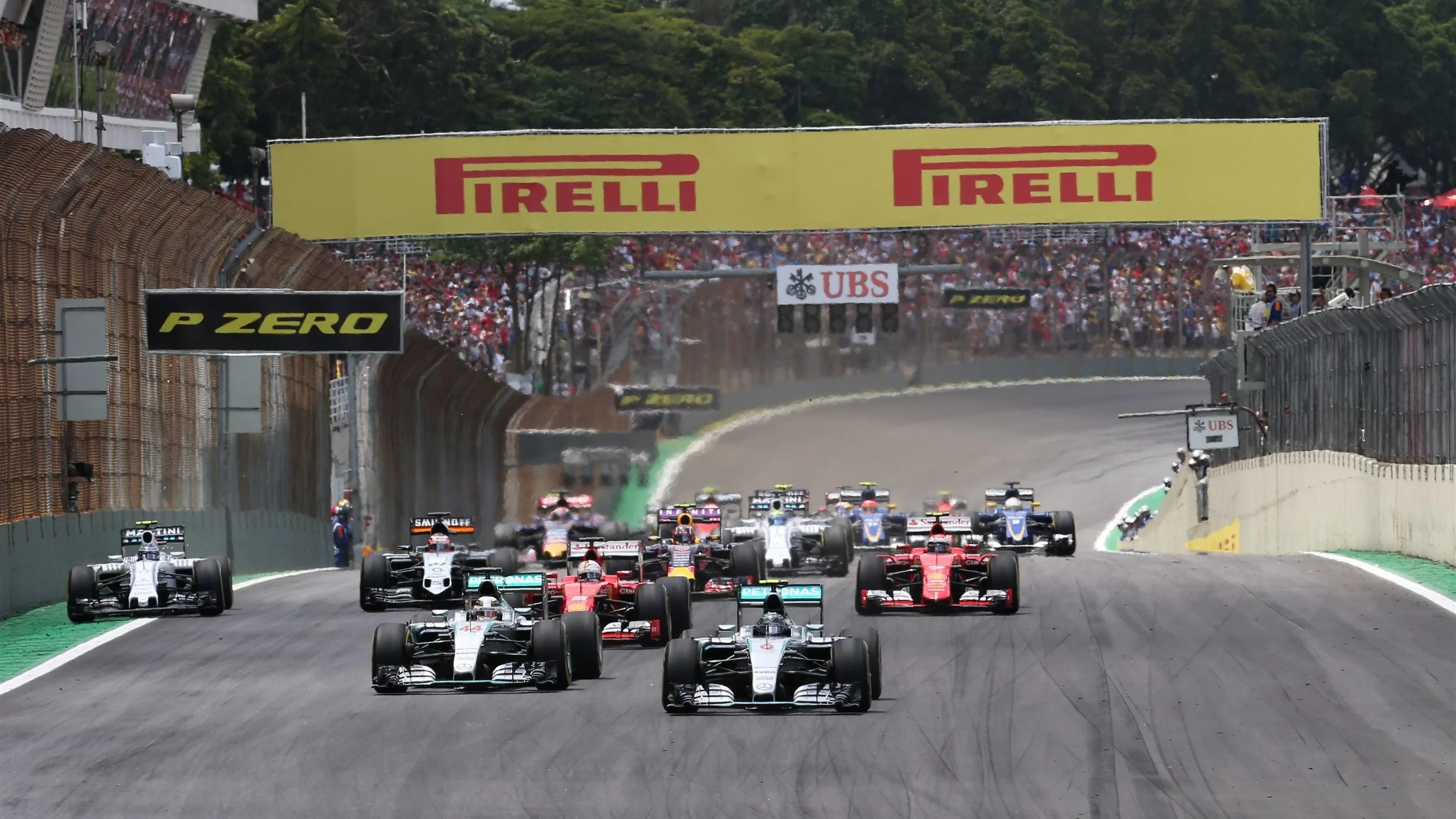 Nico Rosberg (GER) Mercedes AMG F1 W06 and Lewis Hamilton (GBR) Mercedes AMG F1 W06 at the start of