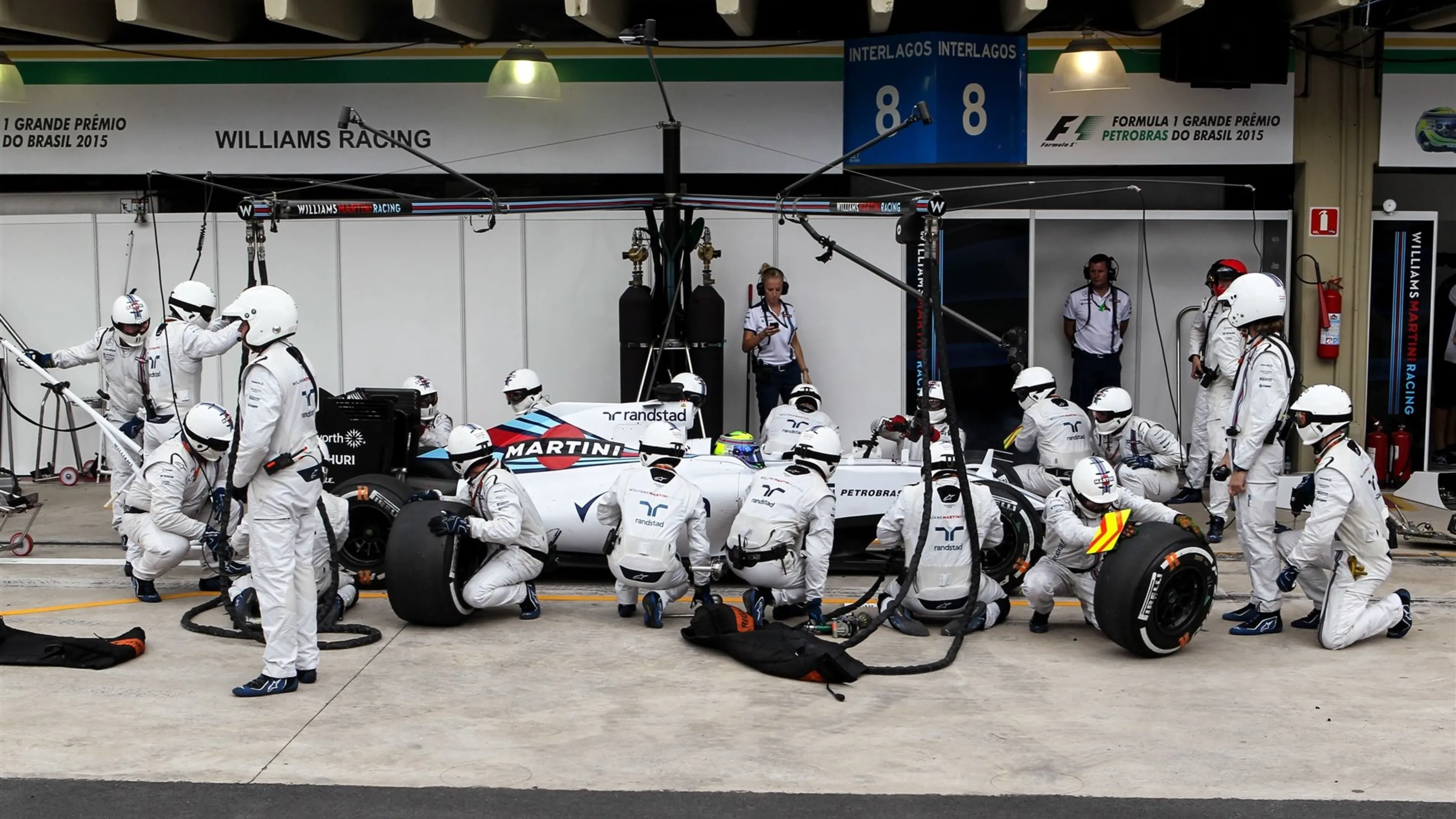 Felipe Massa (BRA) Williams FW37 pit stop at Formula One World Championship, Rd18, Brazilian Grand