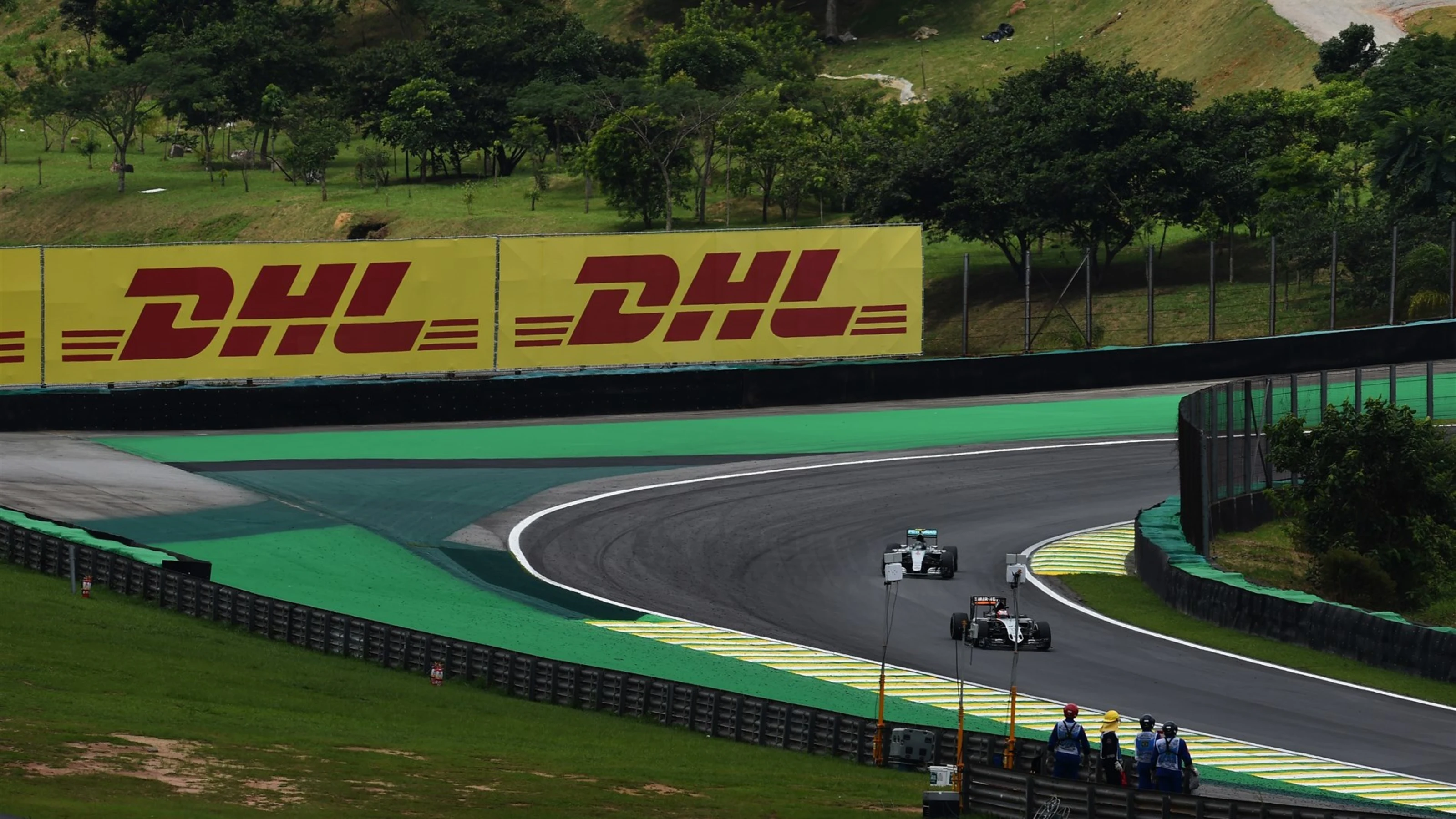 Nico Hulkenberg (GER) Force India VJM08 and Nico Rosberg (GER) Mercedes AMG F1 W06 at Formula One