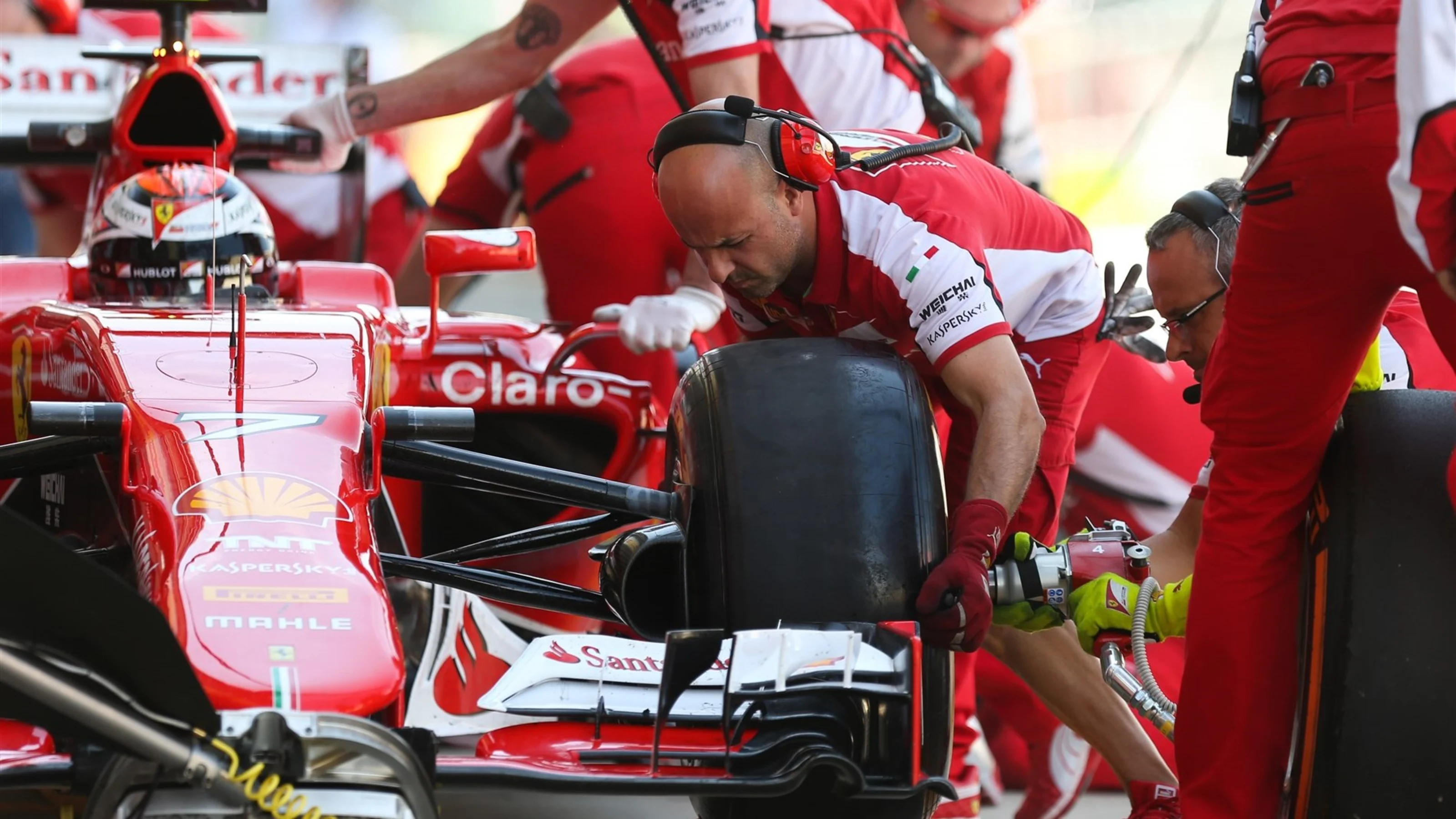 Kimi Raikkonen (FIN) Ferrari SF15-T pit stop at Formula One World Championship, Rd9, British Grand