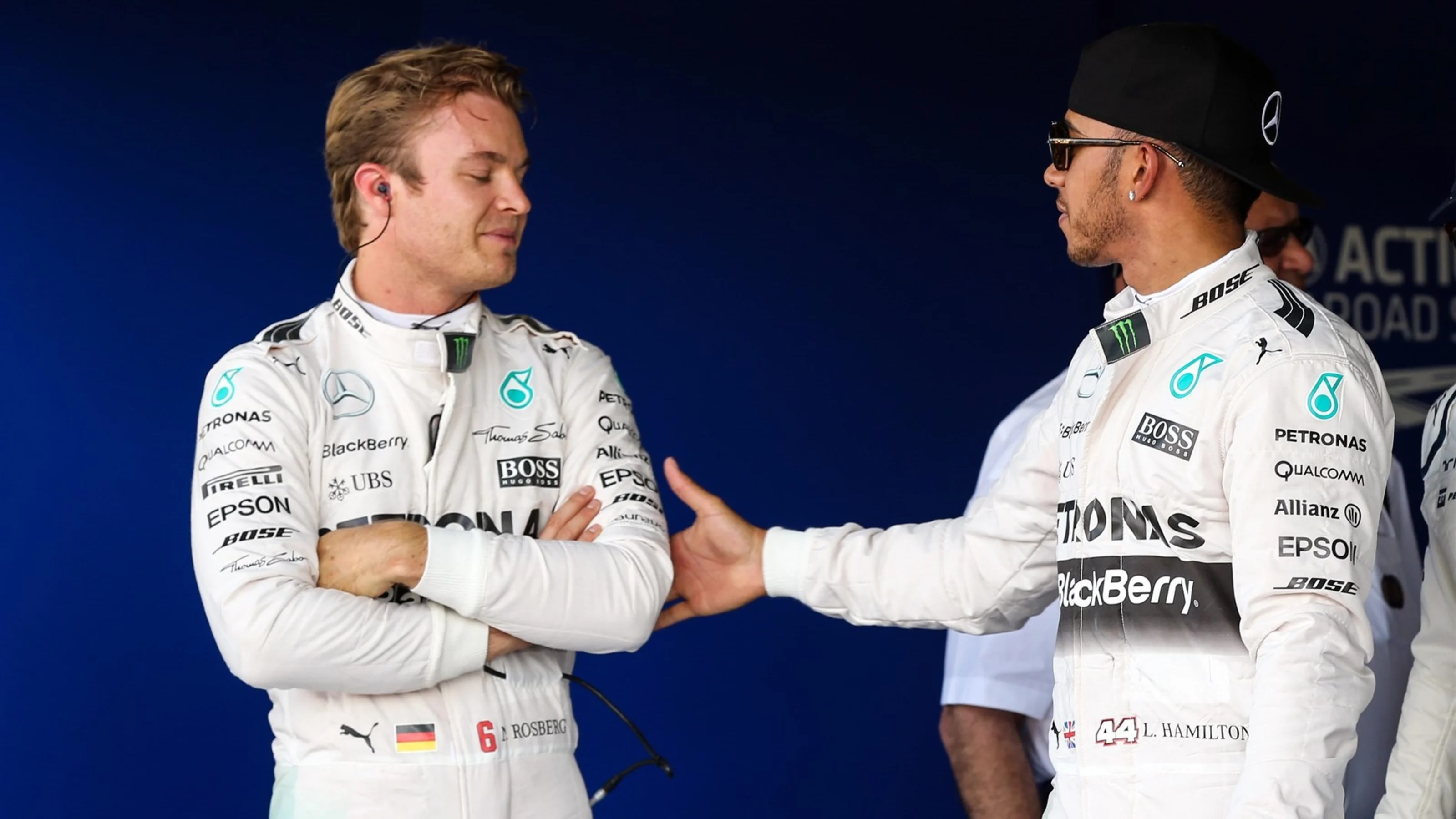 Nico Rosberg (GER) Mercedes AMG F1 celebrates with pole sitter Lewis Hamilton (GBR) Mercedes AMG F1