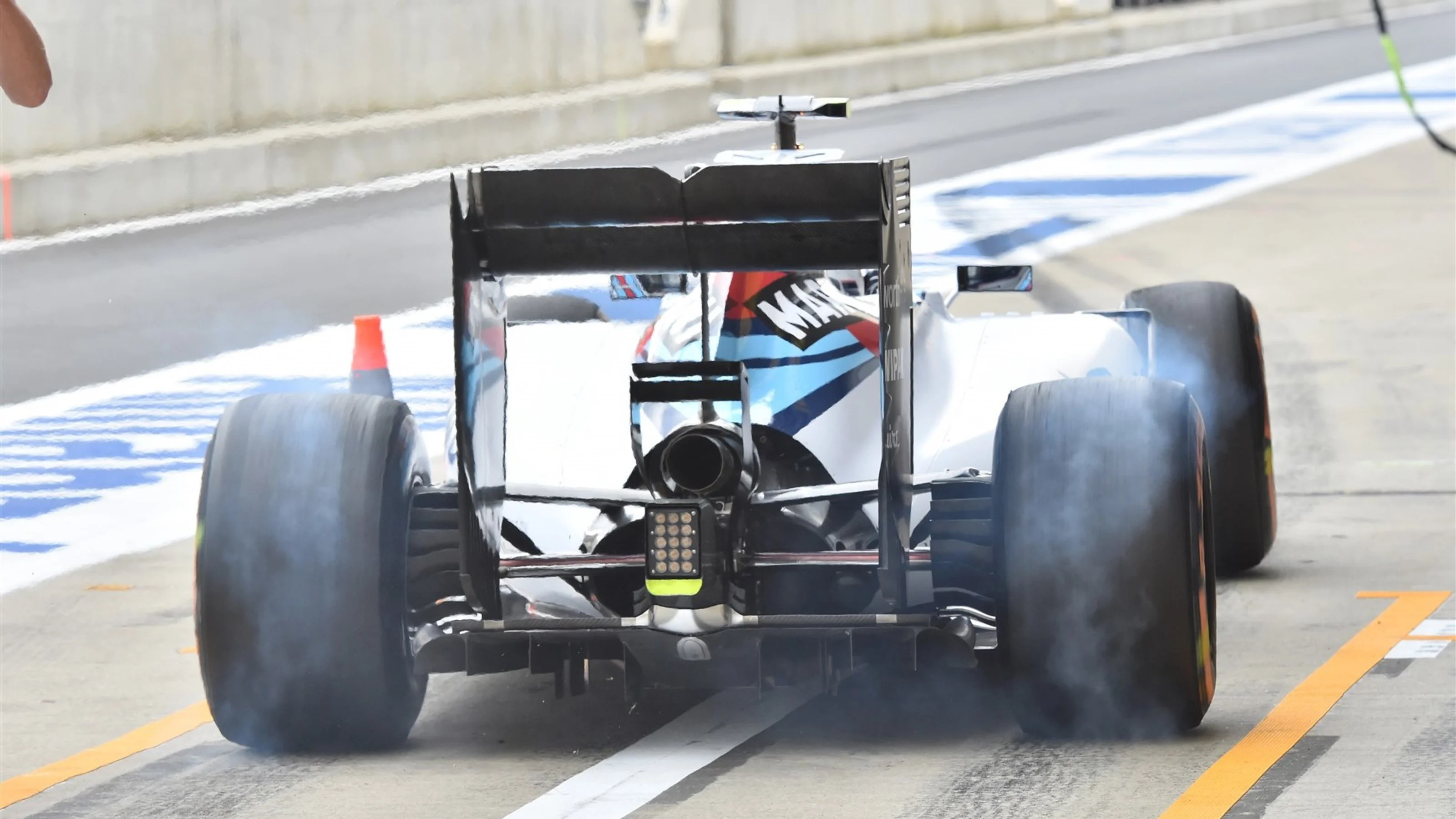 Valtteri Bottas (FIN) Williams FW37 smokes his tyres at Formula One World Championship, Rd9,