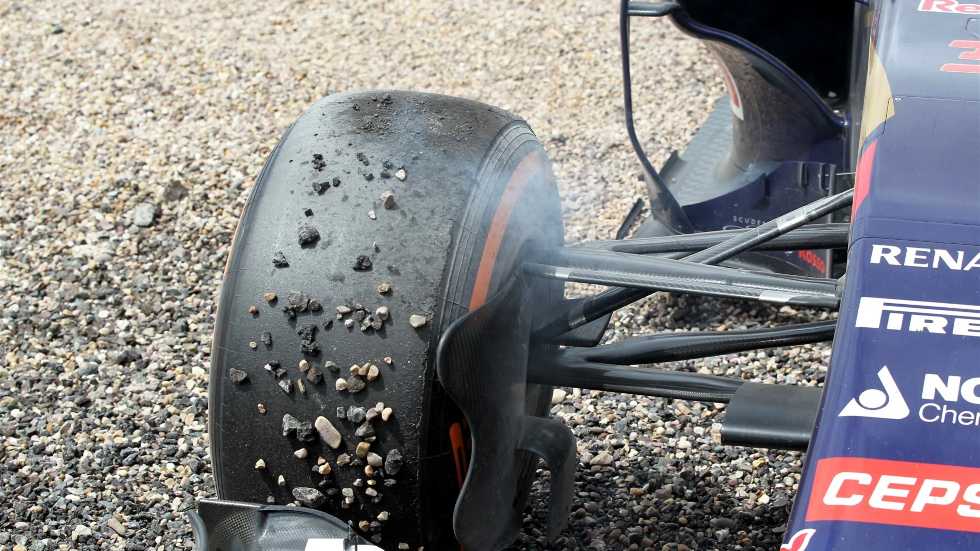 The front tyre Max Verstappen (NDL) Scuderia Toro Rosso STR10 crashed into the gravel at Formula