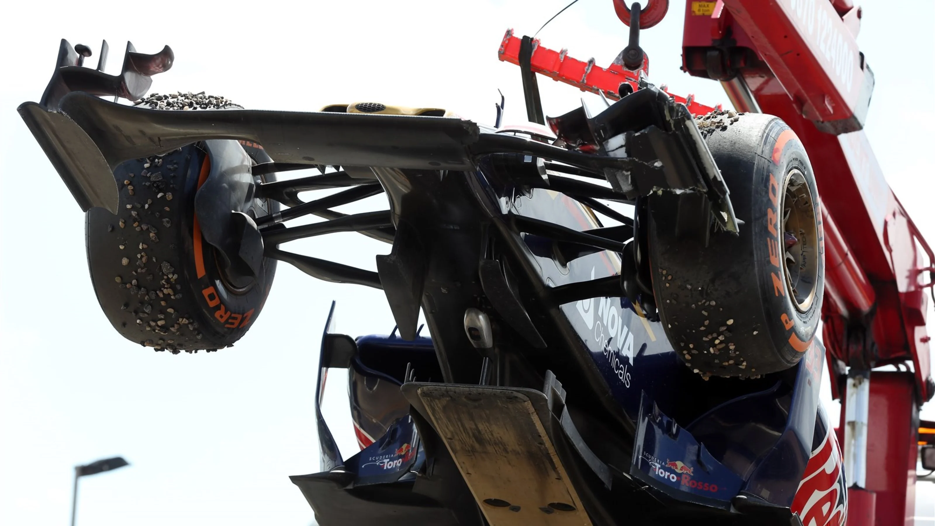 Max Verstappen (NDL) Scuderia Toro Rosso STR10 is recovered after crashing into the gravel at